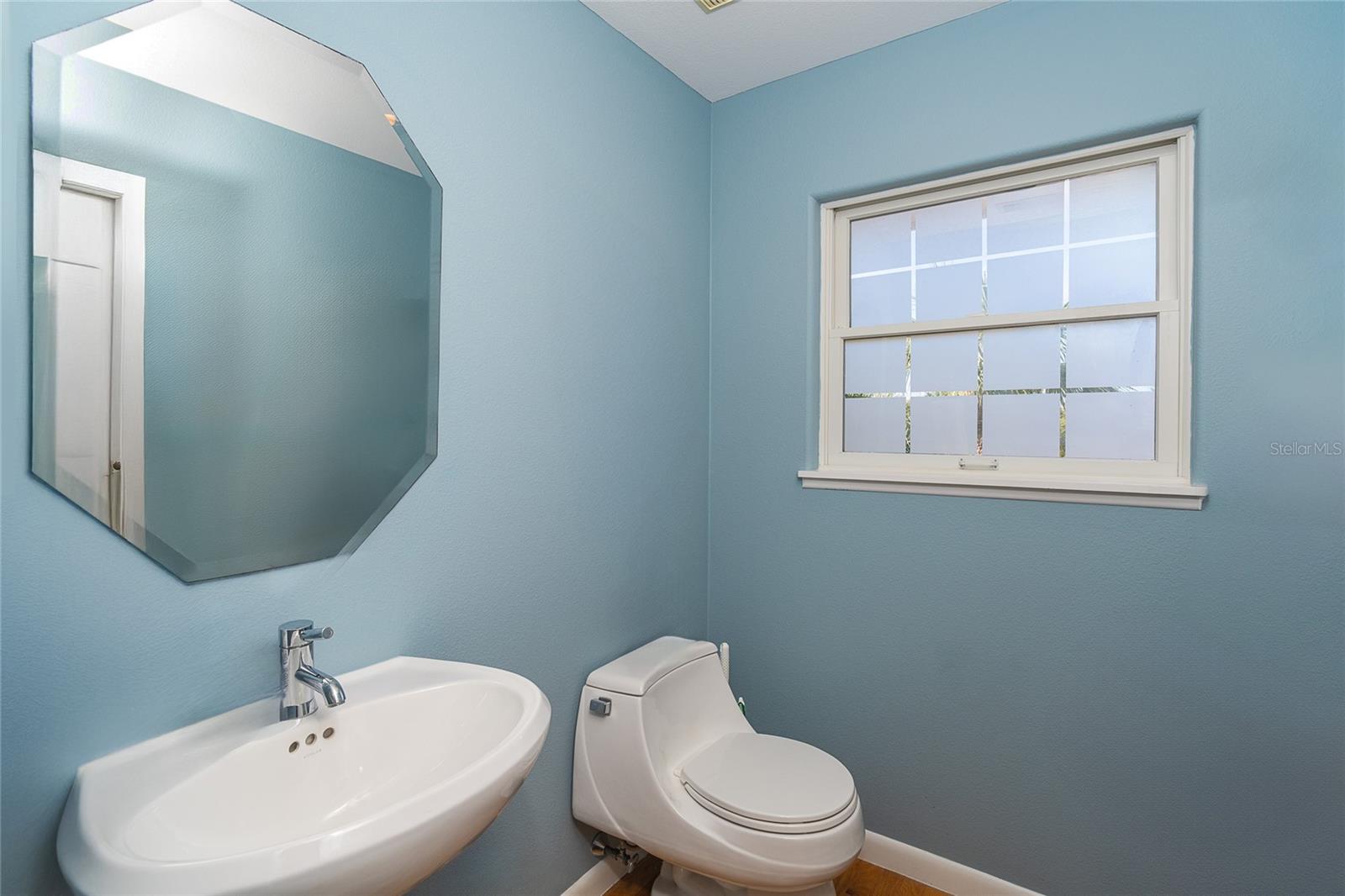 Half Bathroom off Living Area.
