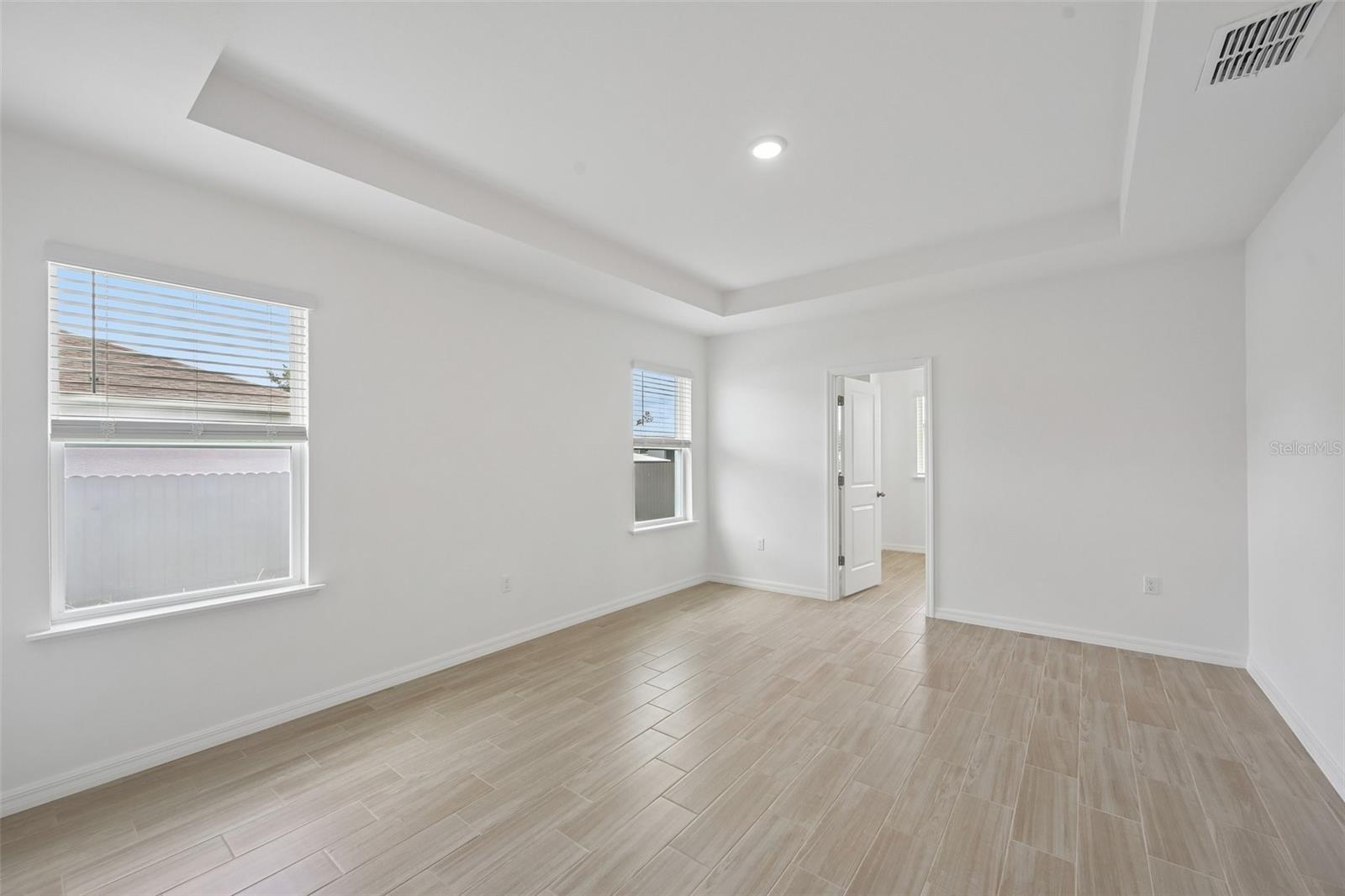 Primary Bedroom with Tray Ceiling