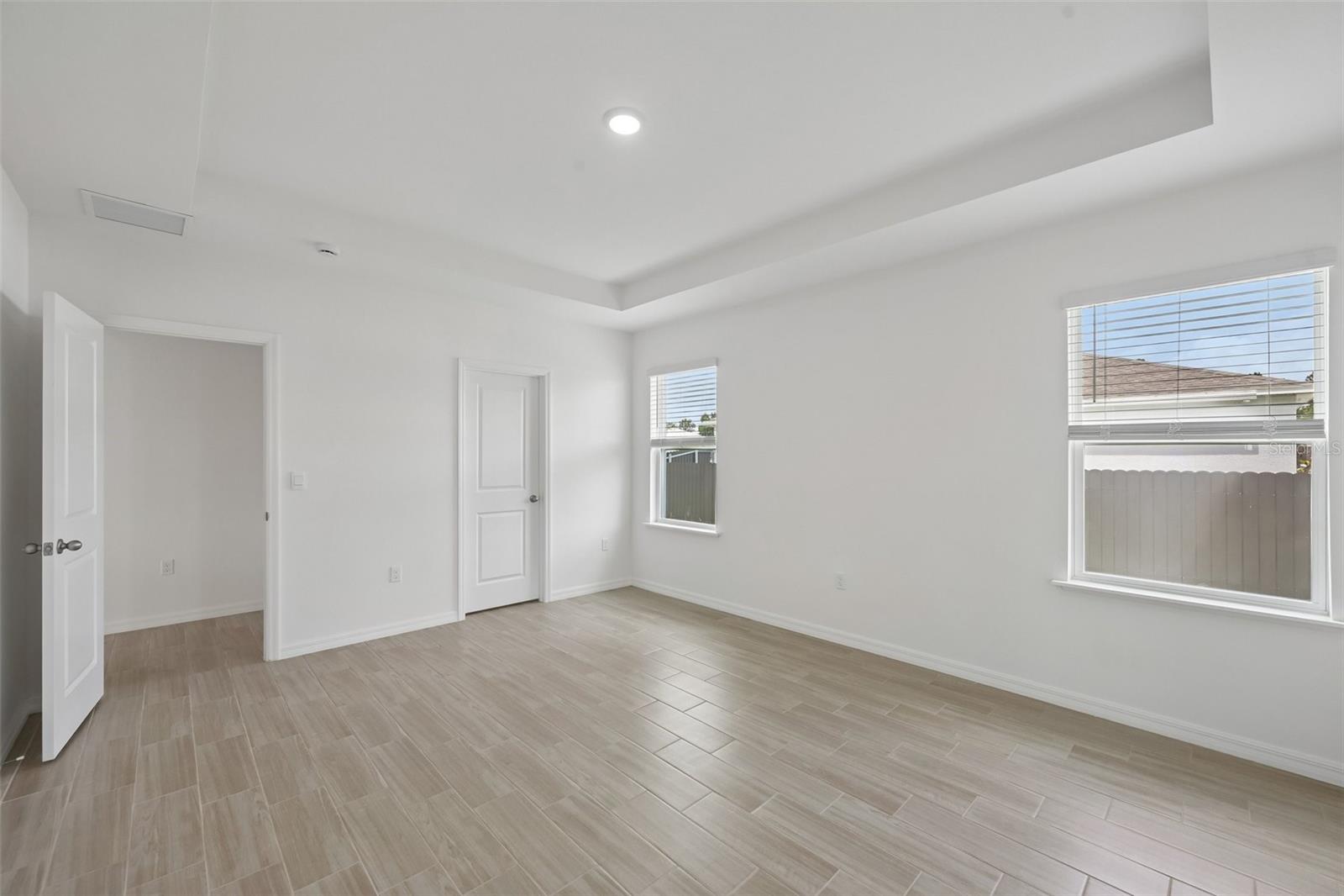 Primary Bedroom with Tray Ceiling
