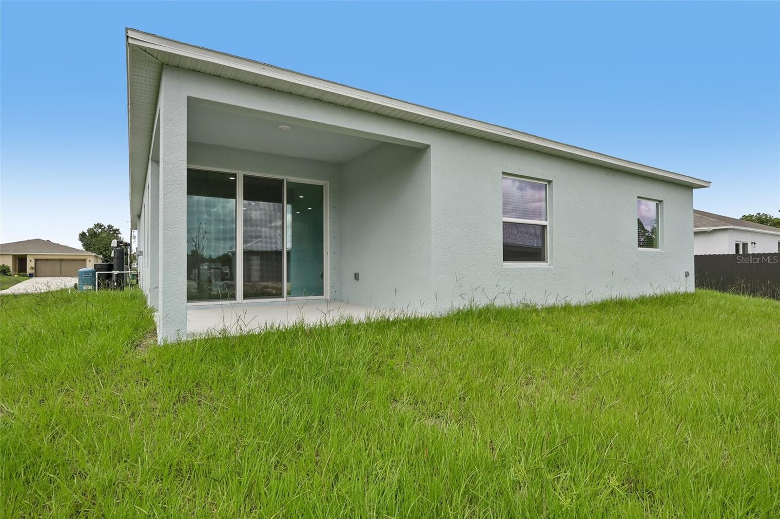 Covered Lanai with Spacious Backyard