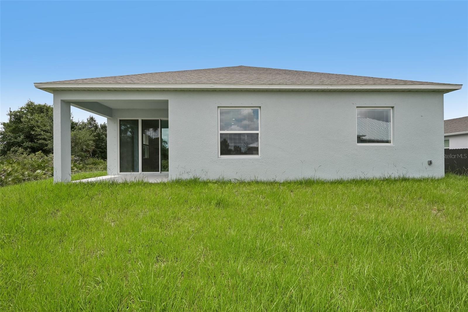 Covered Lanai with Spacious Backyard