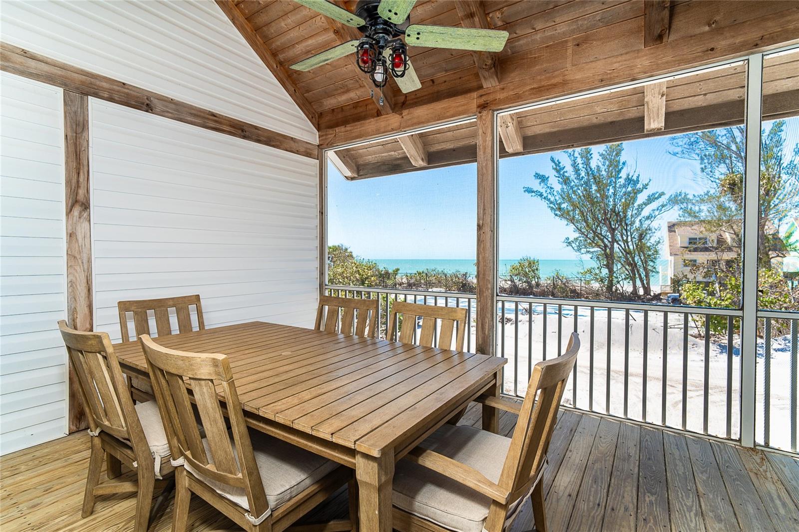 Upstairs Deck with View of the Gulf and Tennis Court.