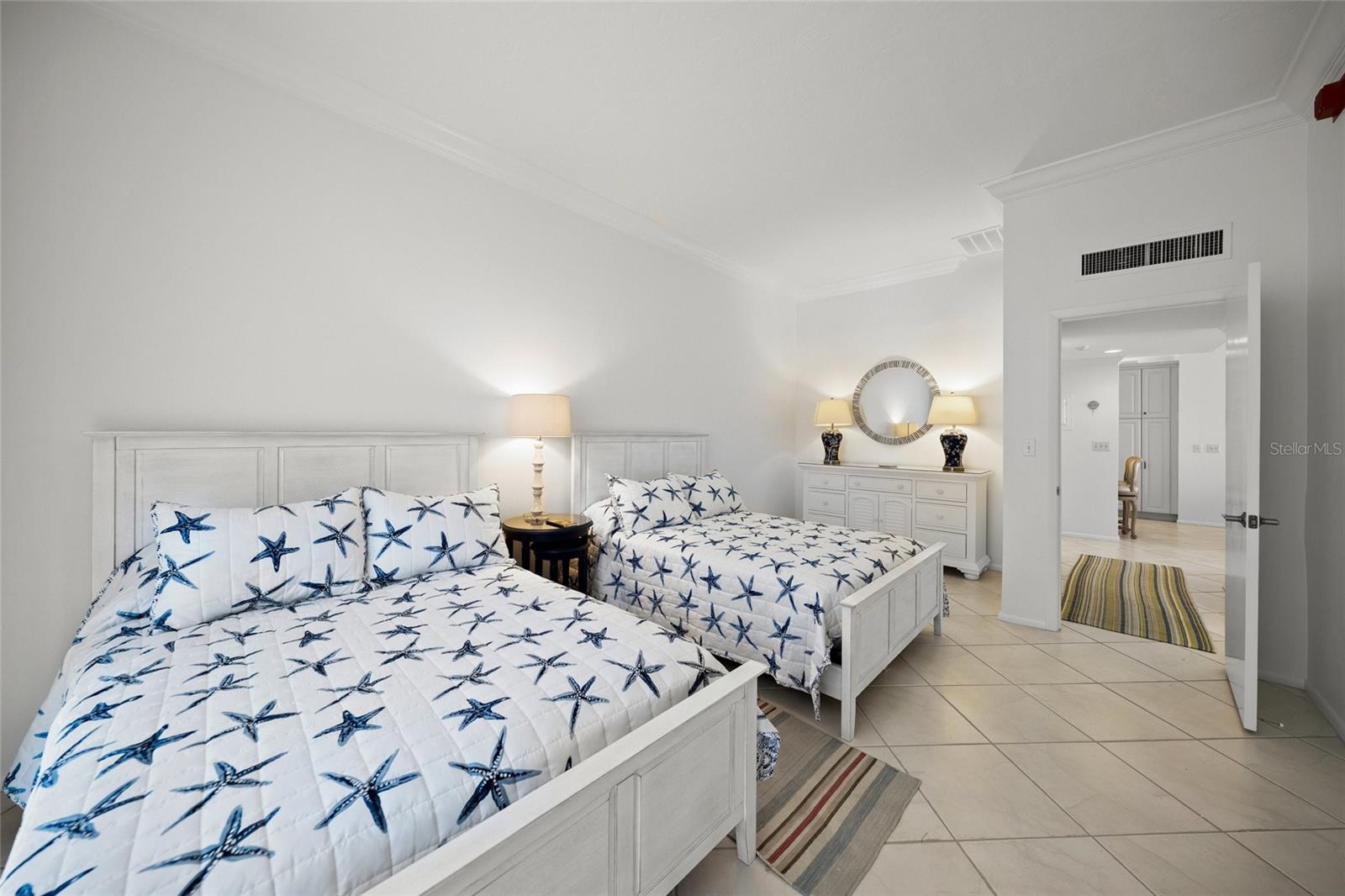 Guest bedroom with two full beds