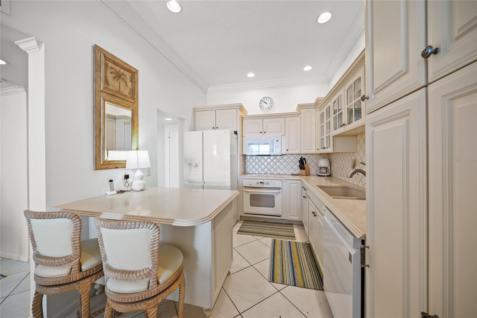 Kitchen with pillowed tile
