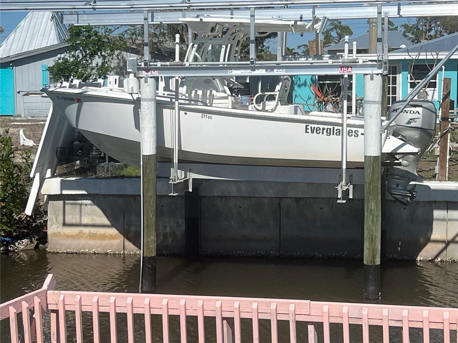 Neighbor's boat across the canal
