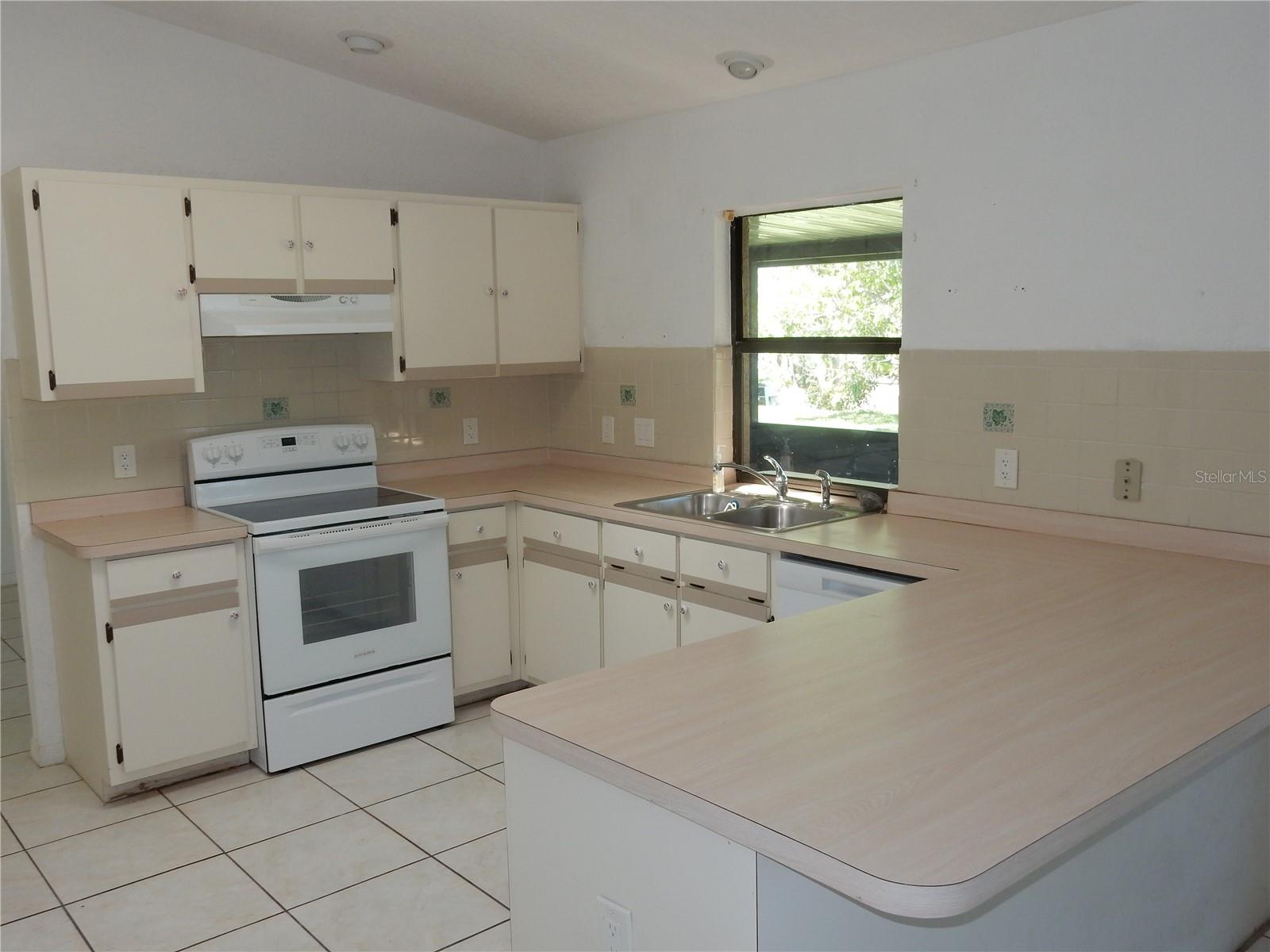 582 Reading St NW, Port Charlotte, FL 33952 — photo 10 of 23