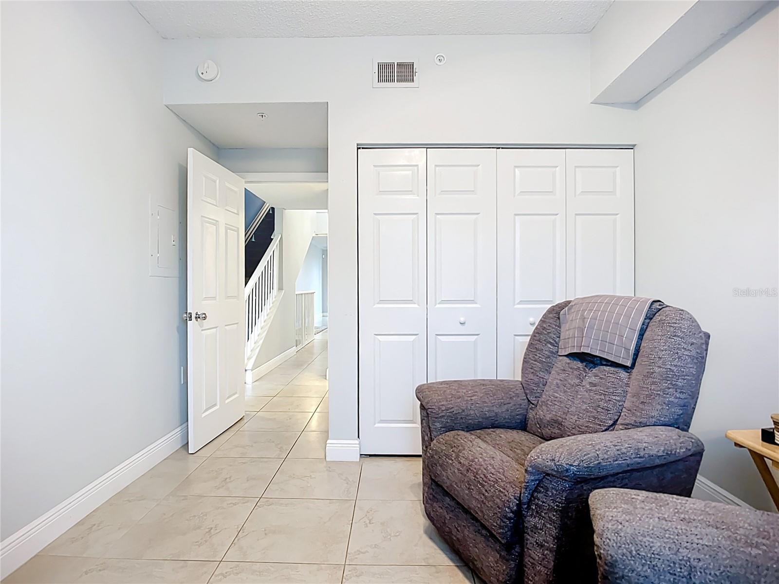 View back to hallway where 2nd bathroom is conveniently located between main living and entertaining areas