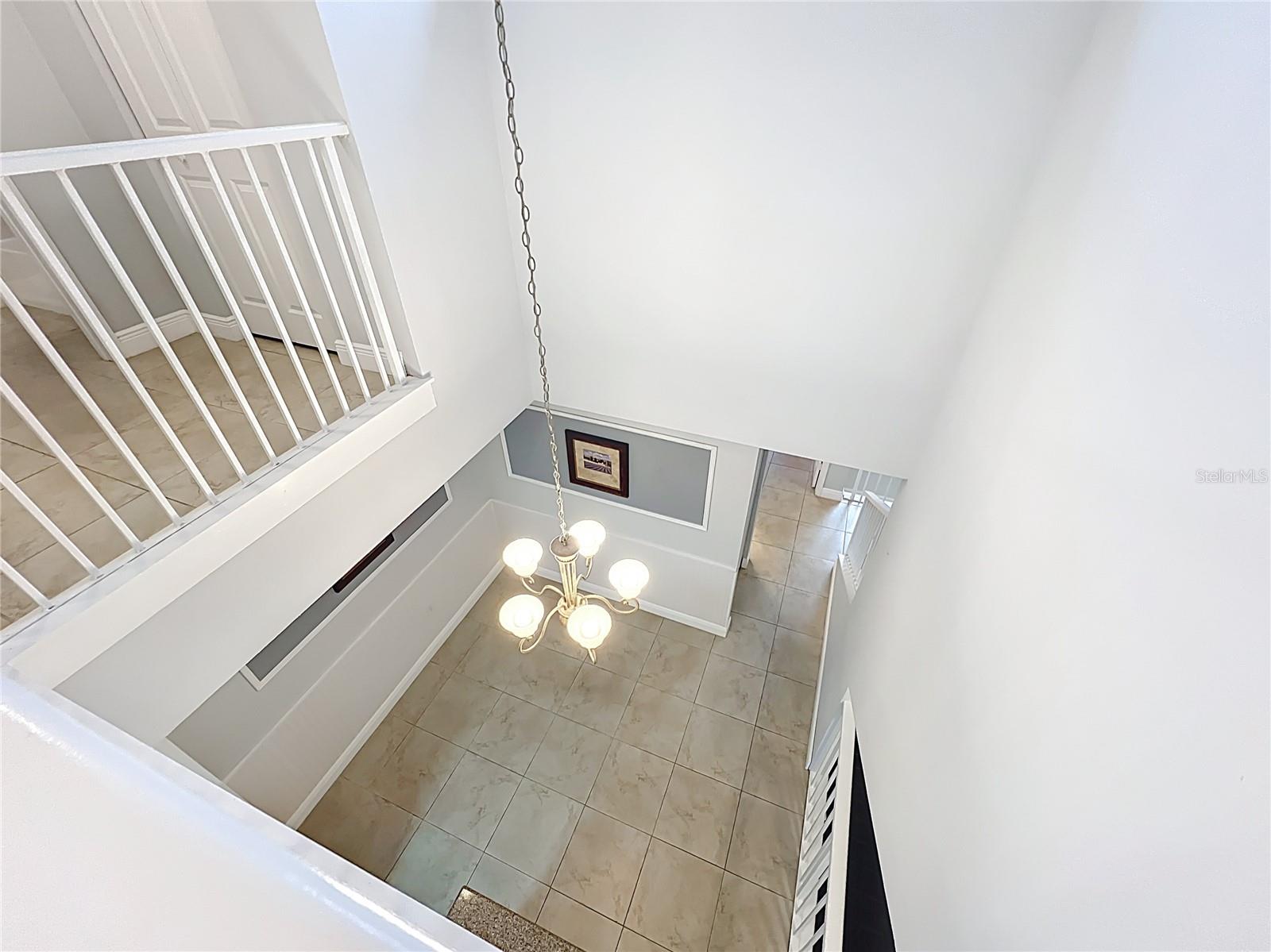 When you arrive the 3rd floor you'll be on the open catwalk hallway overlooking the dining area below