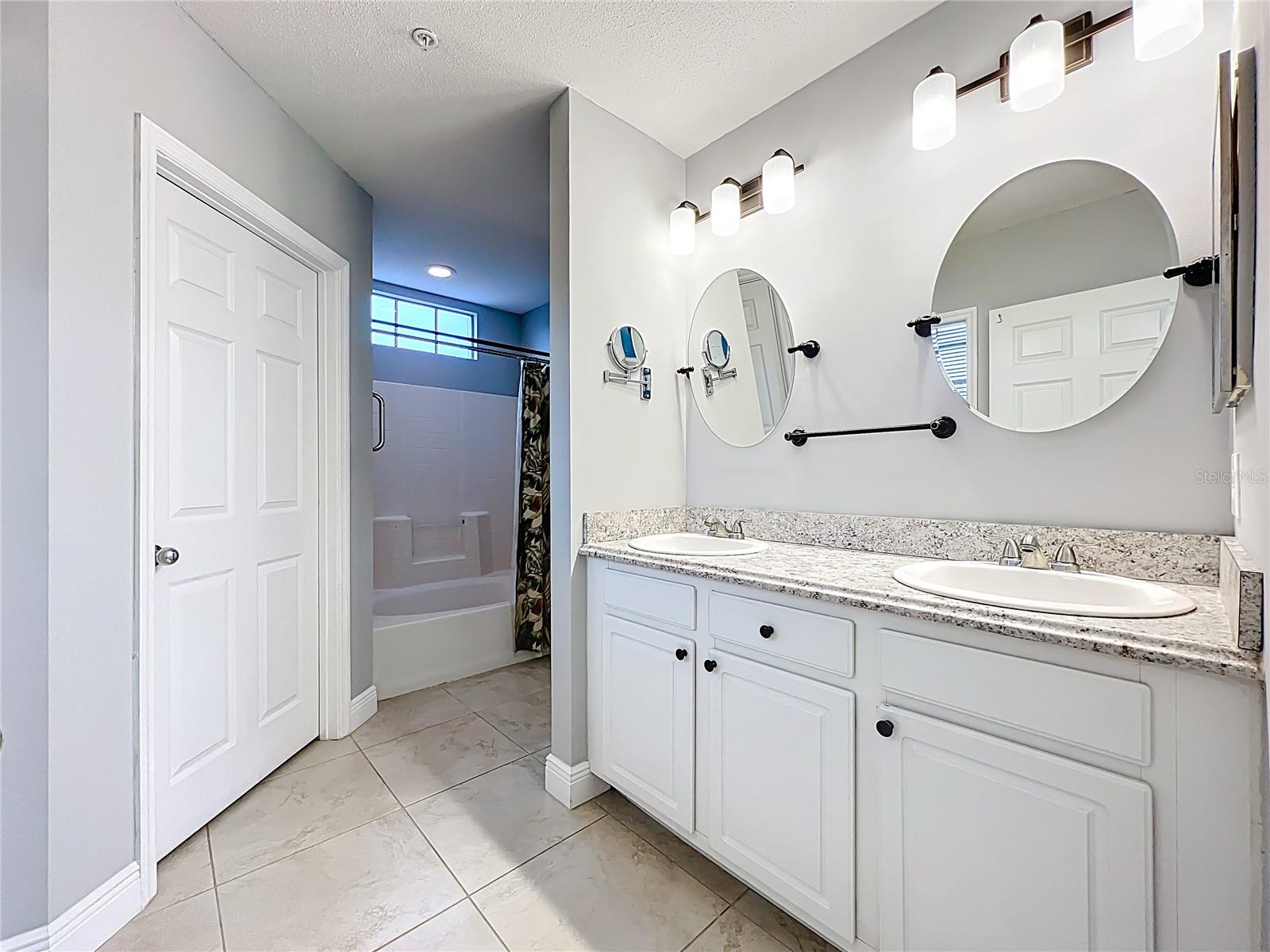 Ensuite primary bath features double sinks