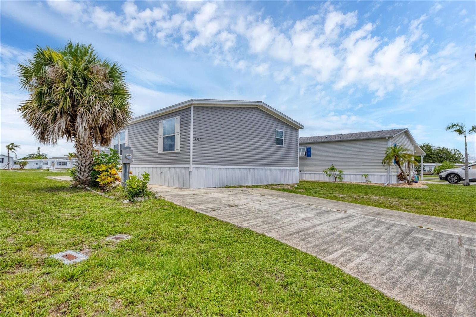 7337 Desant Ln, Port Charlotte, FL 33981 — photo 2 of 50