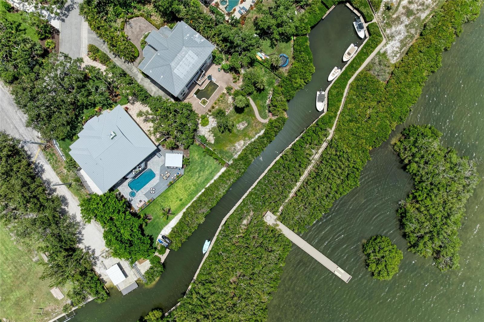 8963 Fishermens Bay Dr, Sarasota, FL 34231 — photo 32 of 97