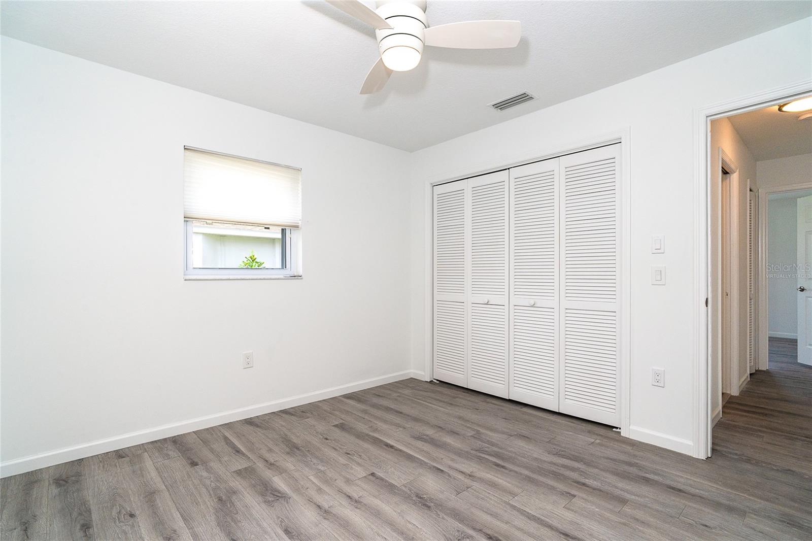 Virtually staged guest bedroom