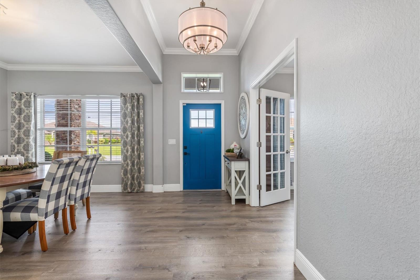 Entrance hallway, note the luxury vinyl flooring throughout the home.