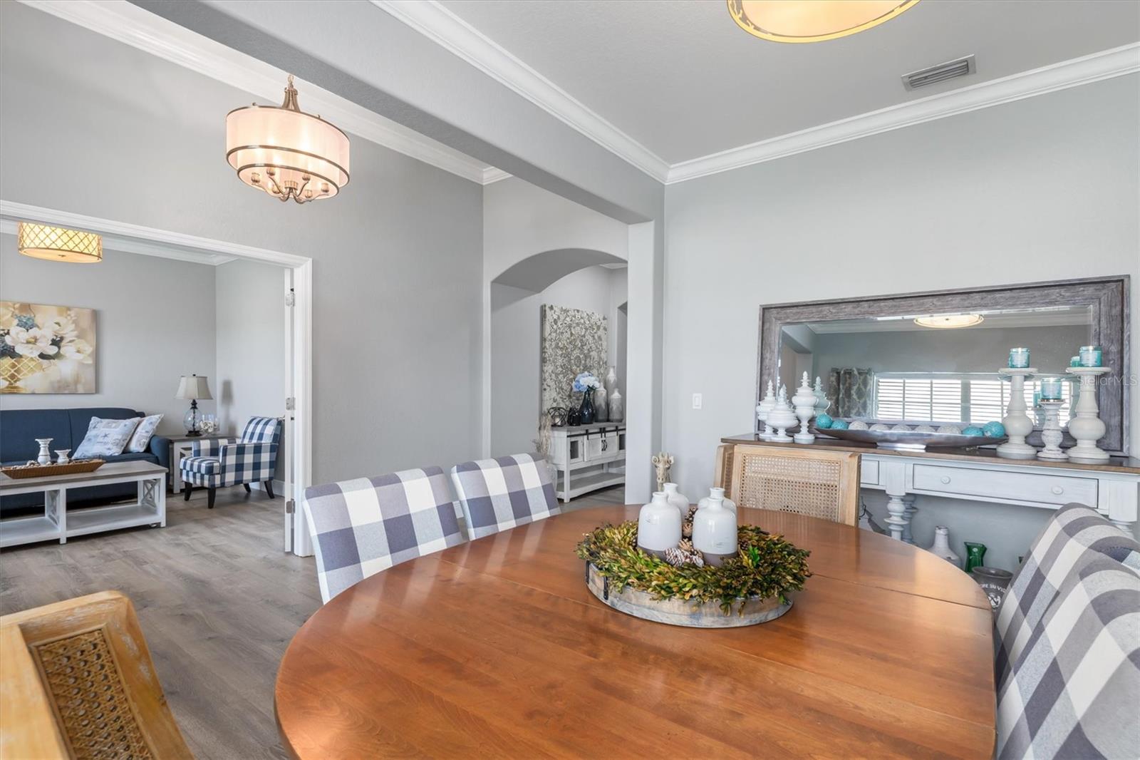 Flexible floorplan with formal dining room and den/office with double glass doors.