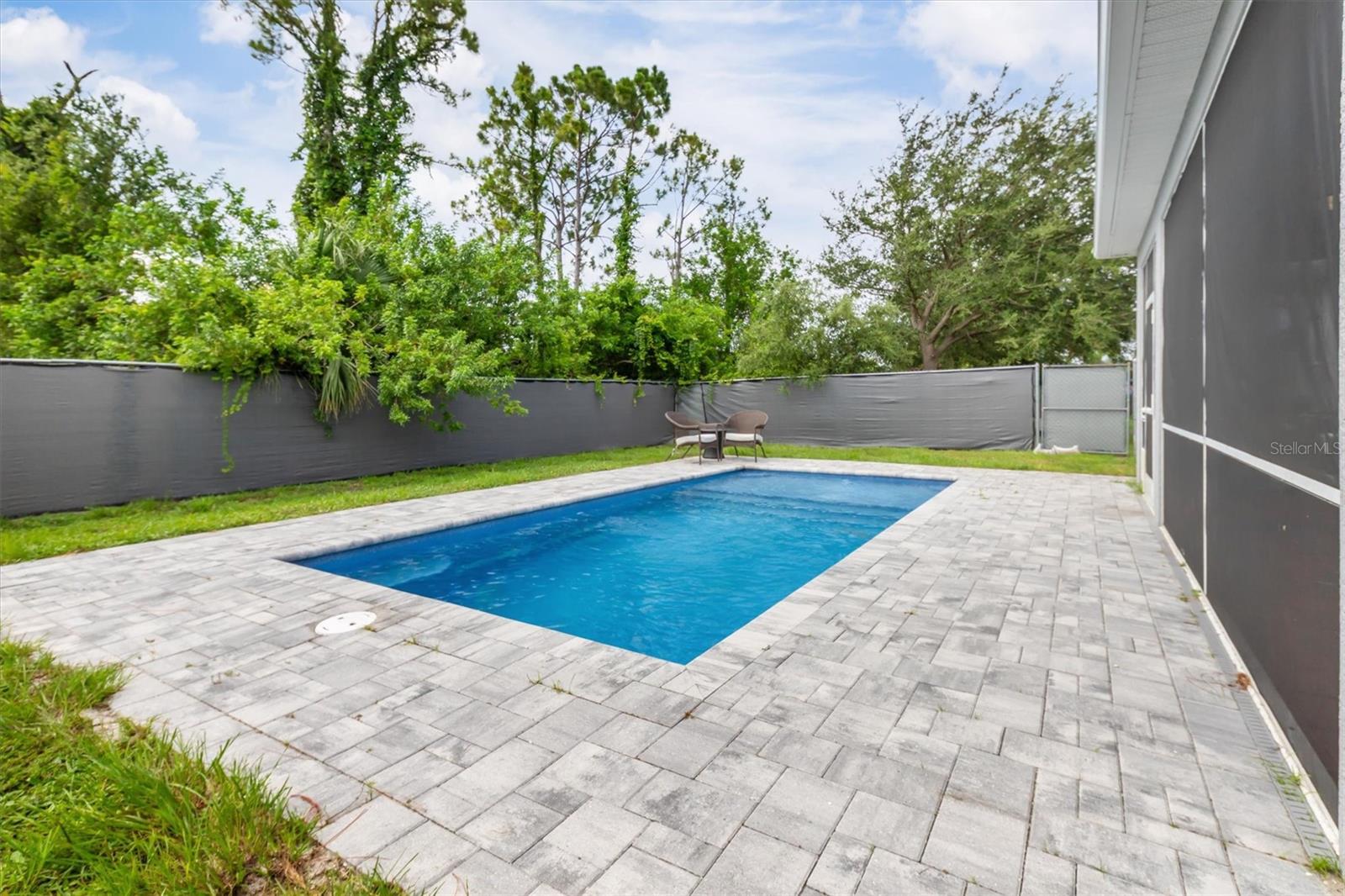 Backyard is perfect for pool parties and BBQ.
