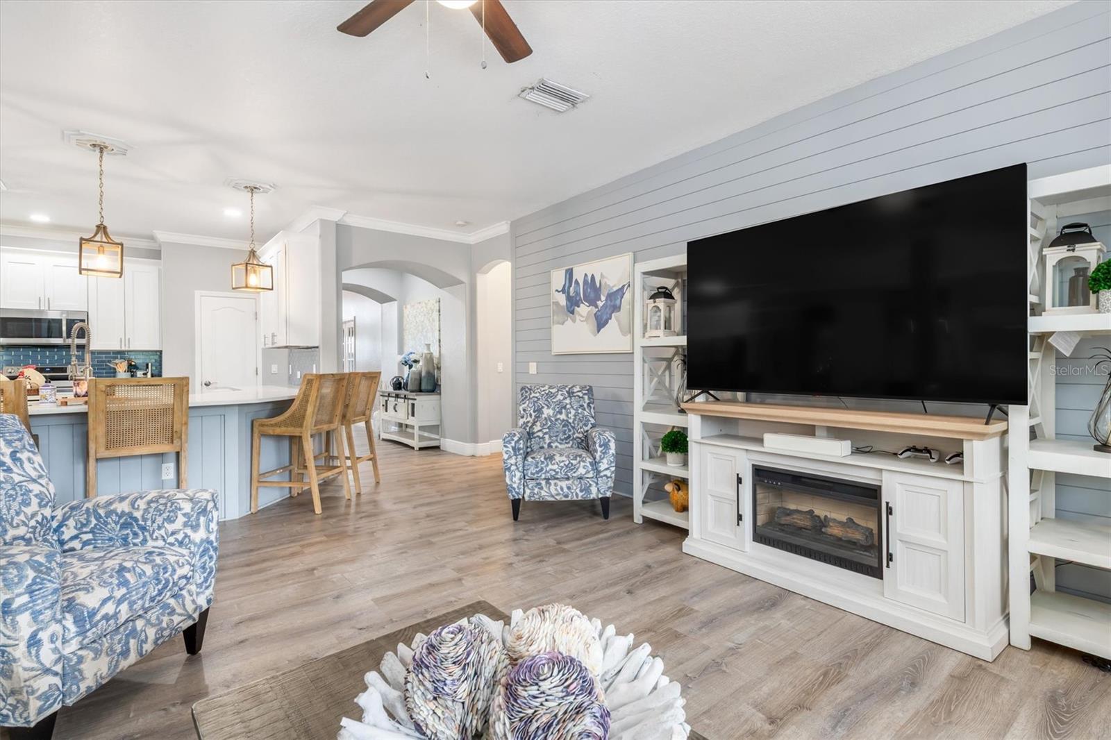 Open floorplan with kitchen and family room at center of the home.