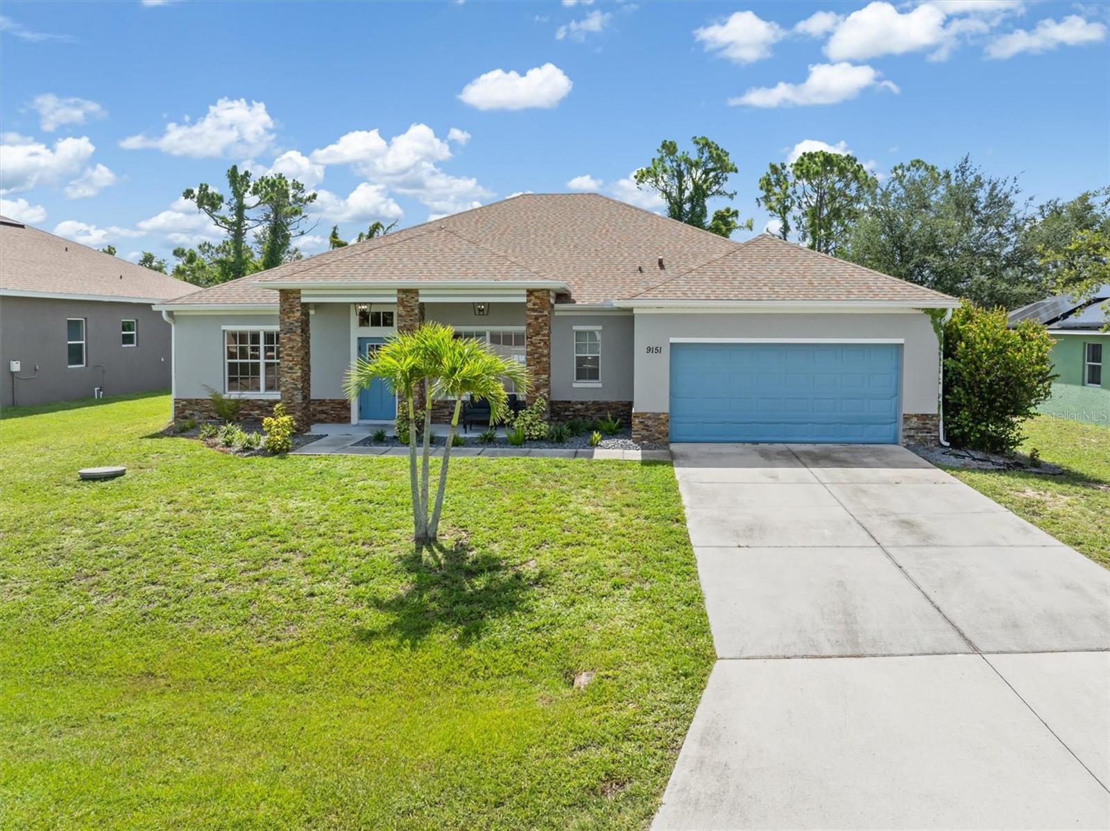 Established landscaping at front of house.