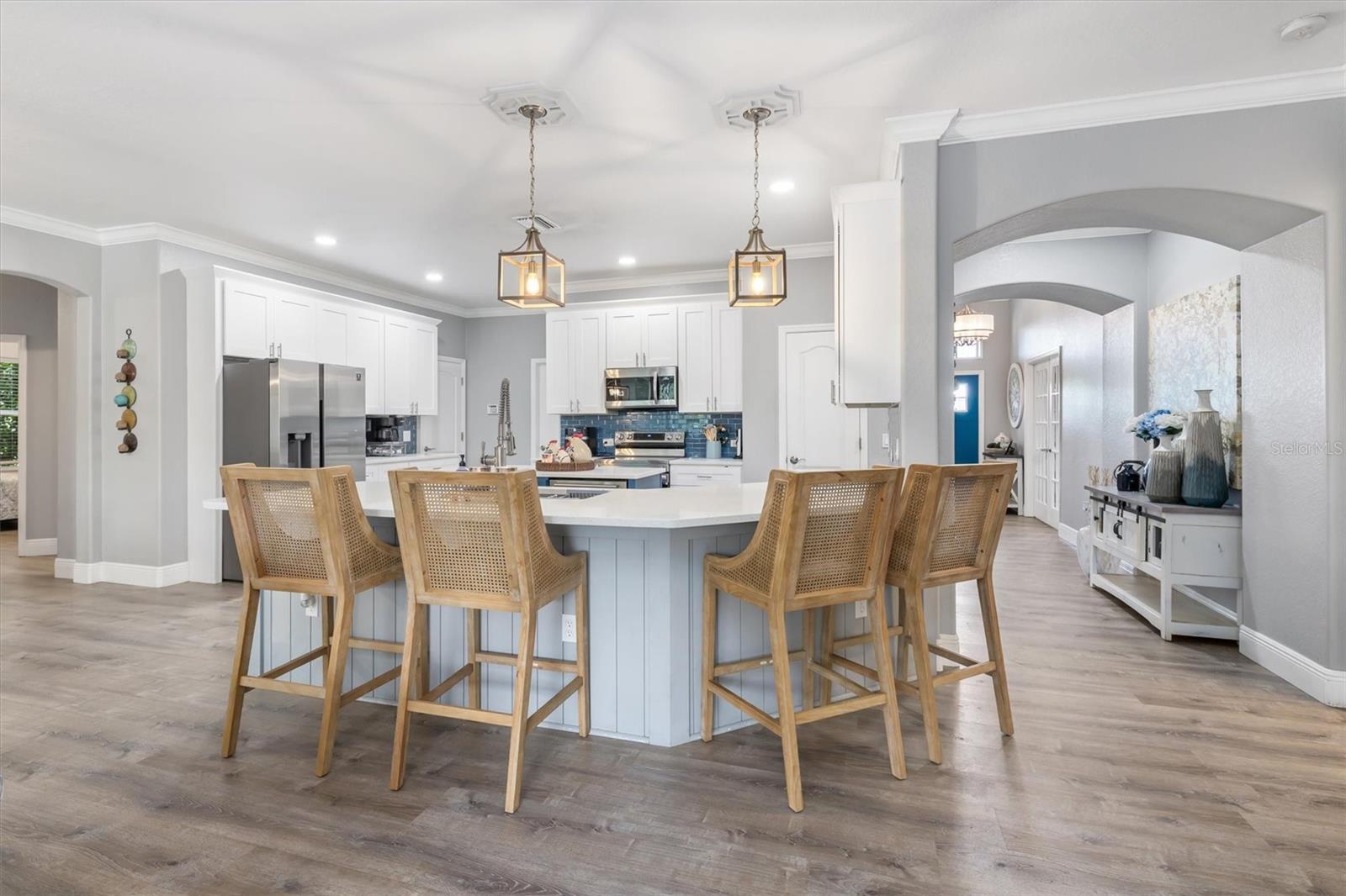 Room to sit around the kitchen countertop.