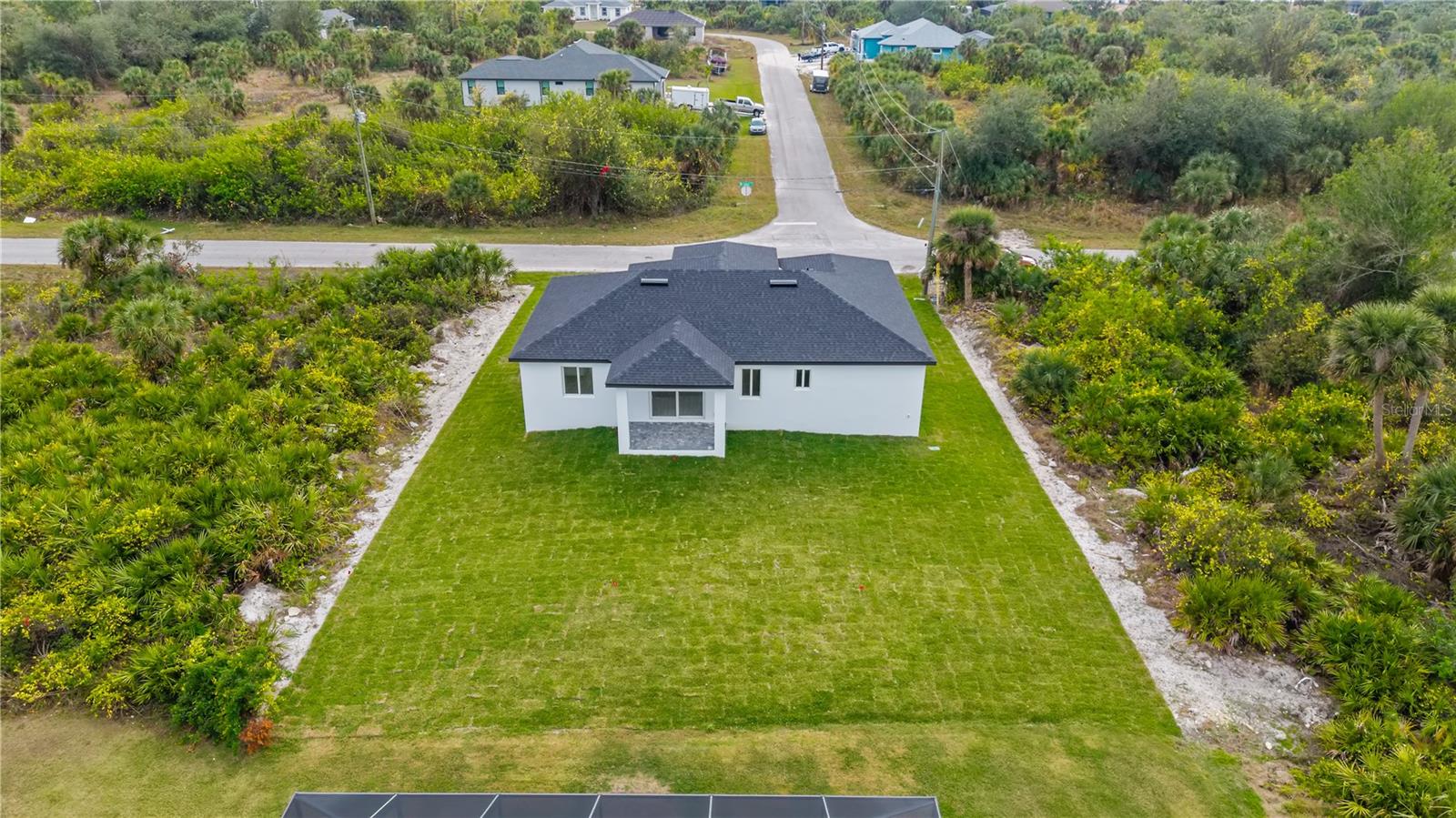 13438 McIntosh Ave, Port Charlotte, FL 33981 — photo 37 of 53