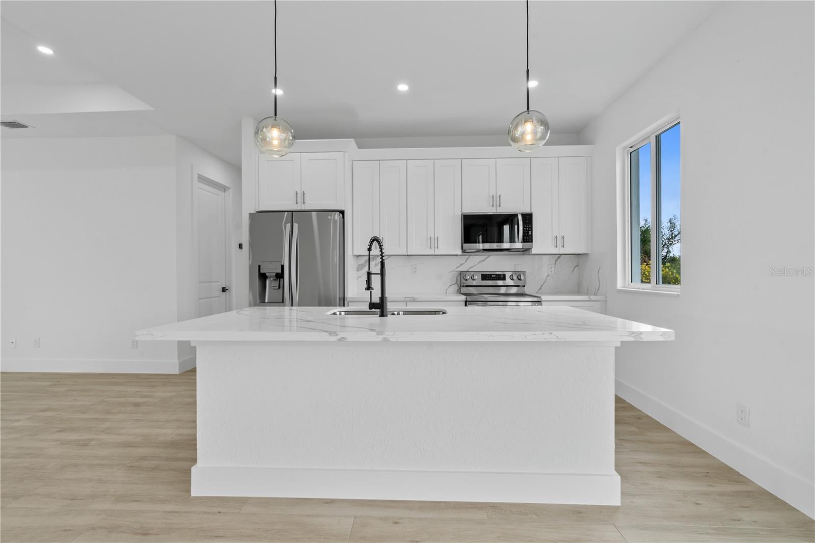13438 McIntosh Ave, Port Charlotte, FL 33981 — photo 8 of 53