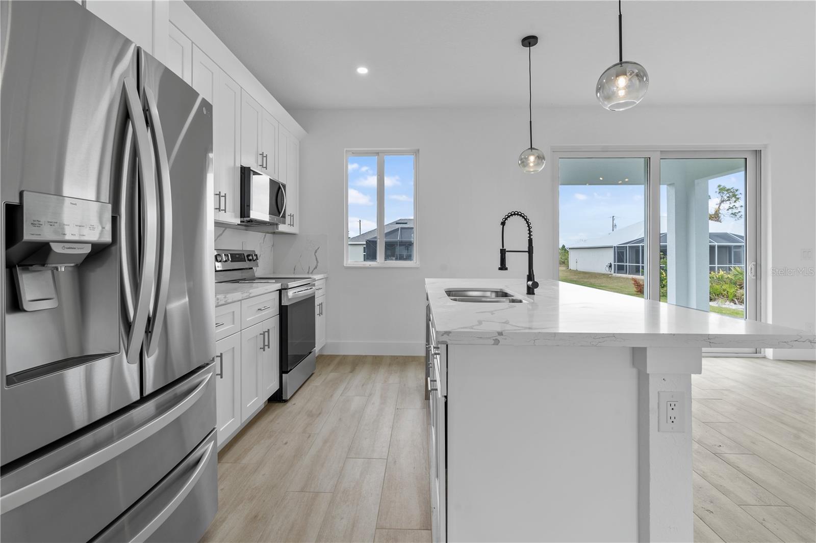 13438 McIntosh Ave, Port Charlotte, FL 33981 — photo 10 of 53