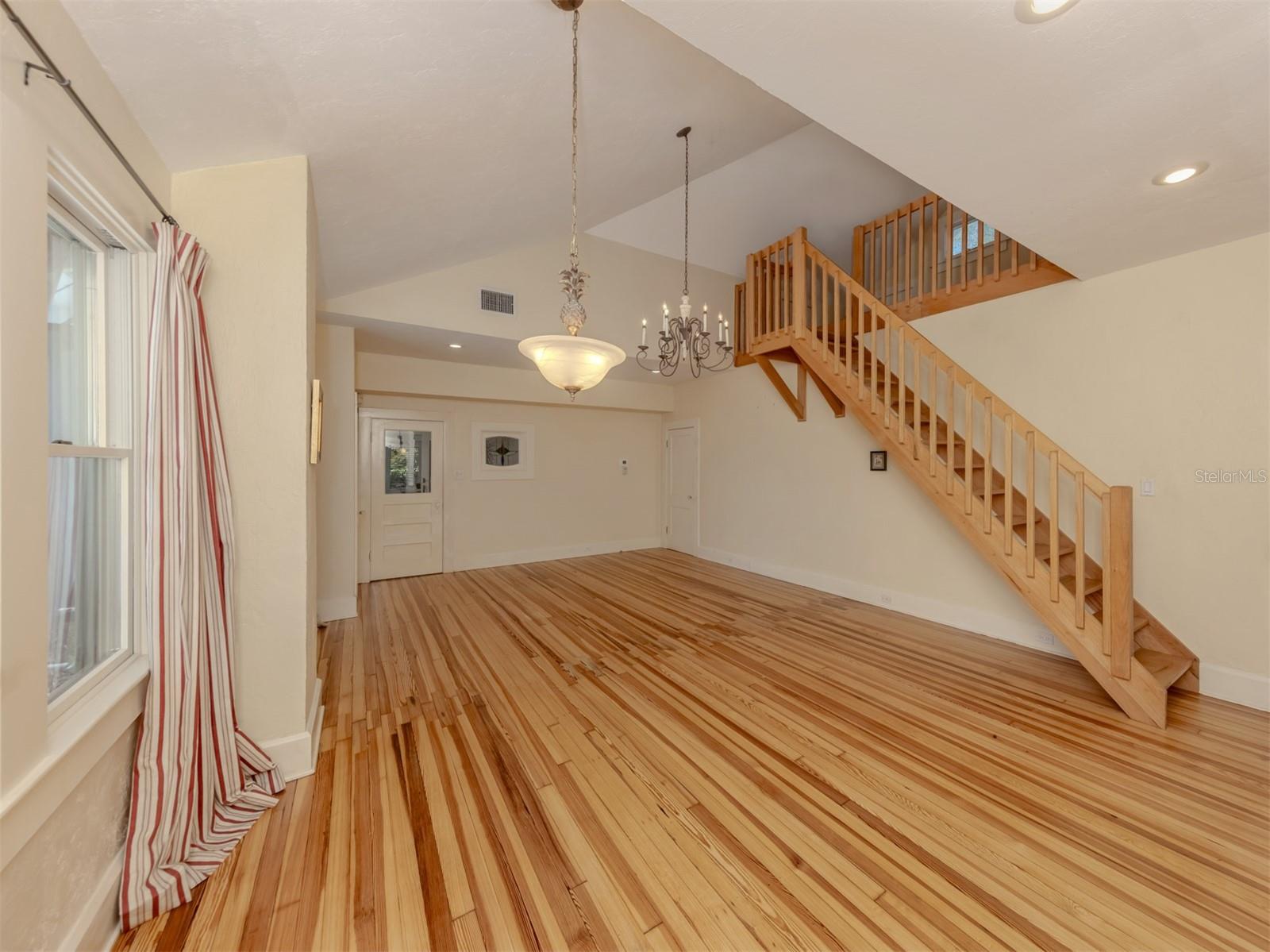 Dining room, great room, stairs to loft
