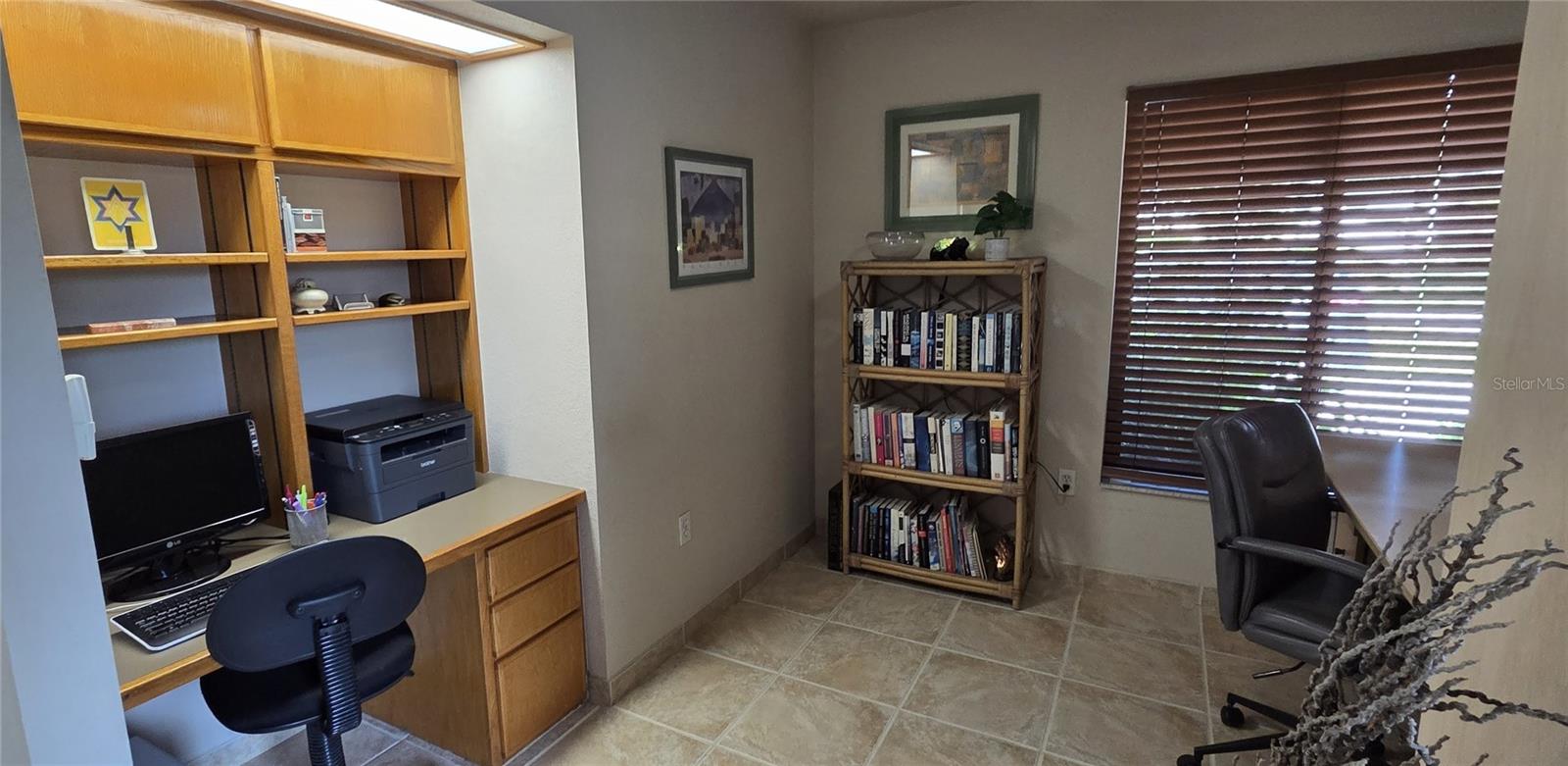 Office with built-in desk and shelves 8 x11