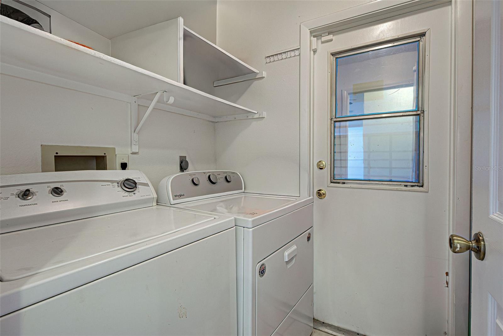 Laundry room, under air, washer included.
