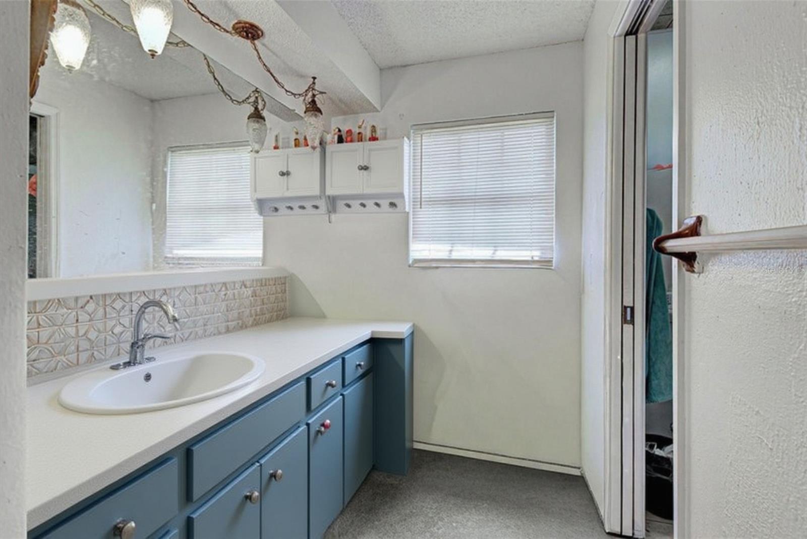 Virtual cabinet and sink renovation to compare.