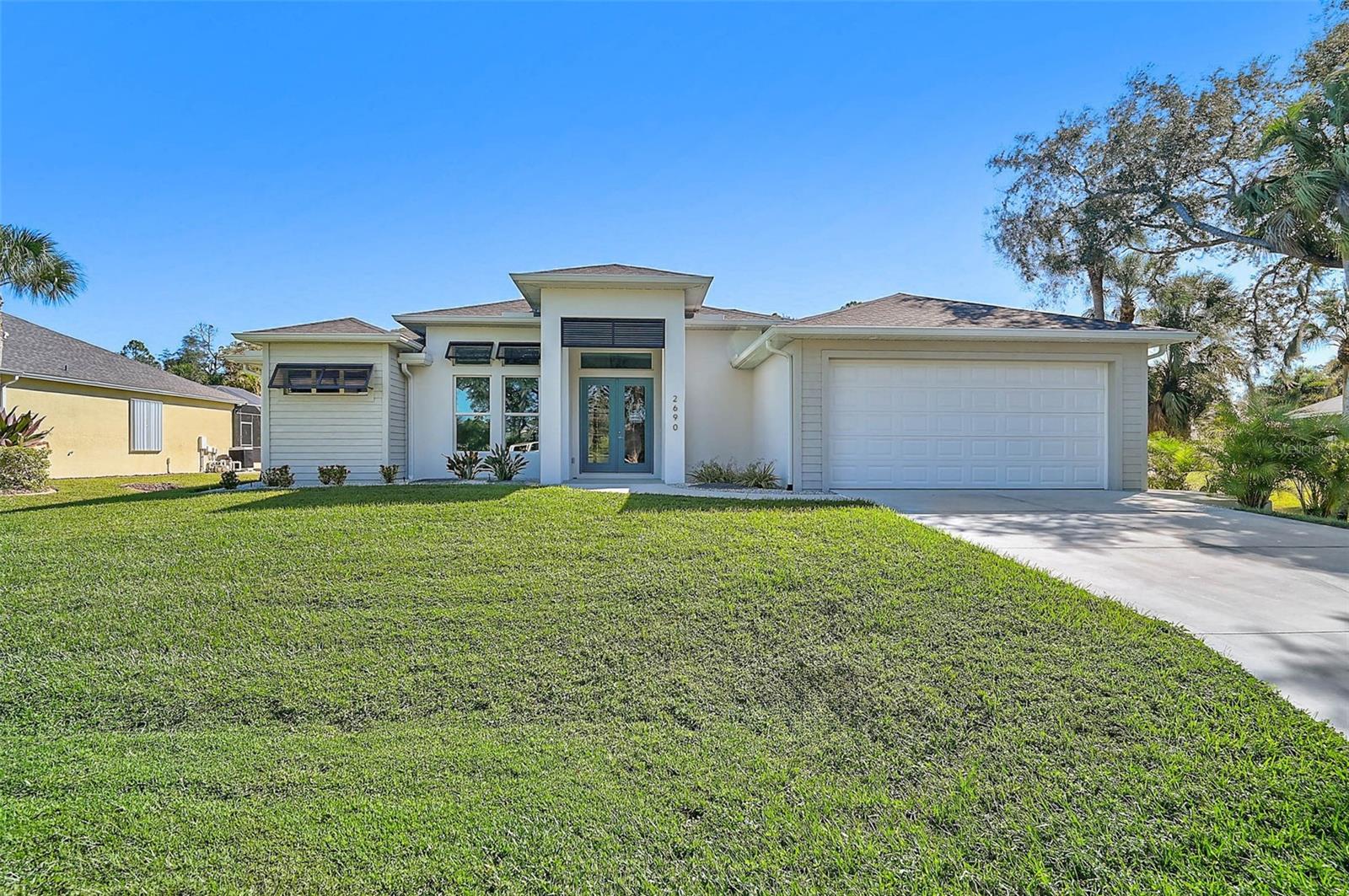 2690 Pebble Creek Pl, Port Charlotte, FL 33948 — photo 2 of 62