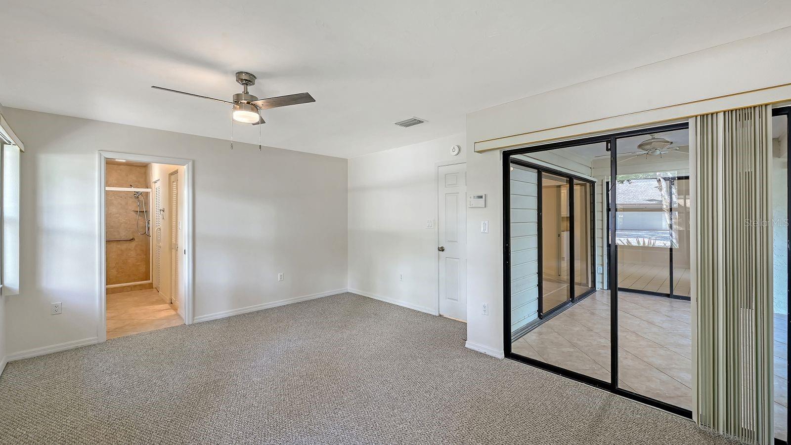 Primary Bedroom with access to the FL room