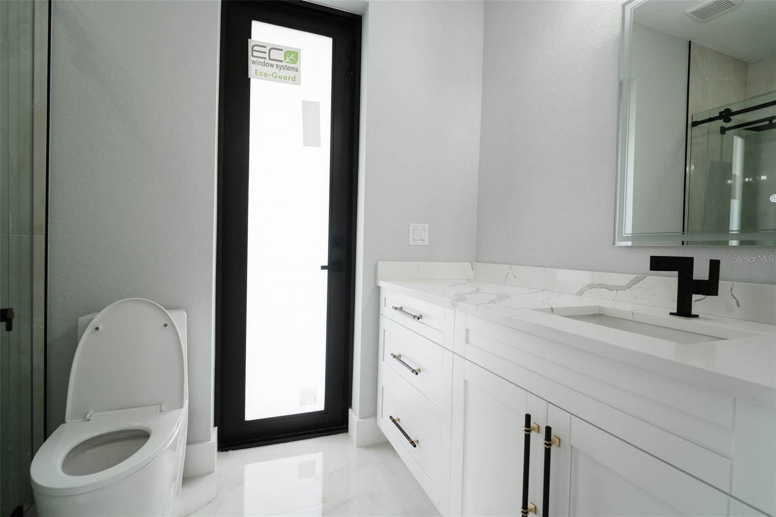 pool bathroom with direct access to- from the lanai