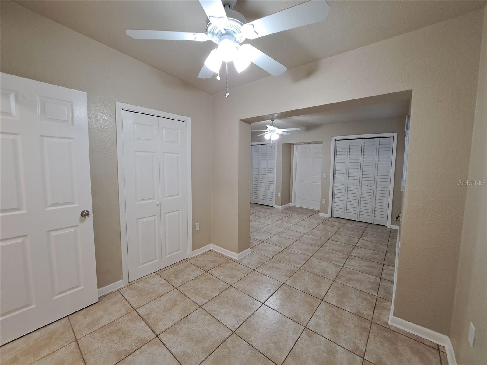 Entering Primary bedroom you see additional storage in this Bonus space.