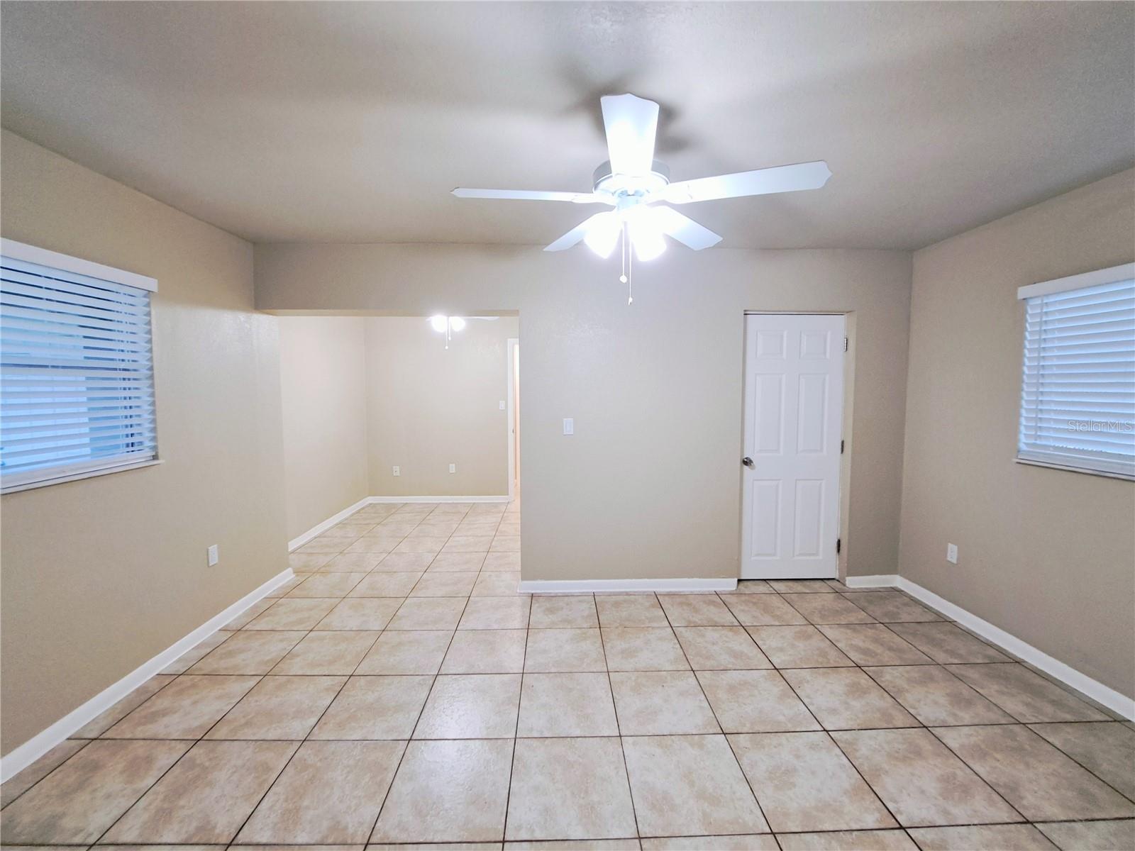 Looking Back toward the Primary bedroom entrance, you will see the bonus space that would be a perfect home office, nursery, exercise space, lounge/book knook, or whatever your imagination can think up.