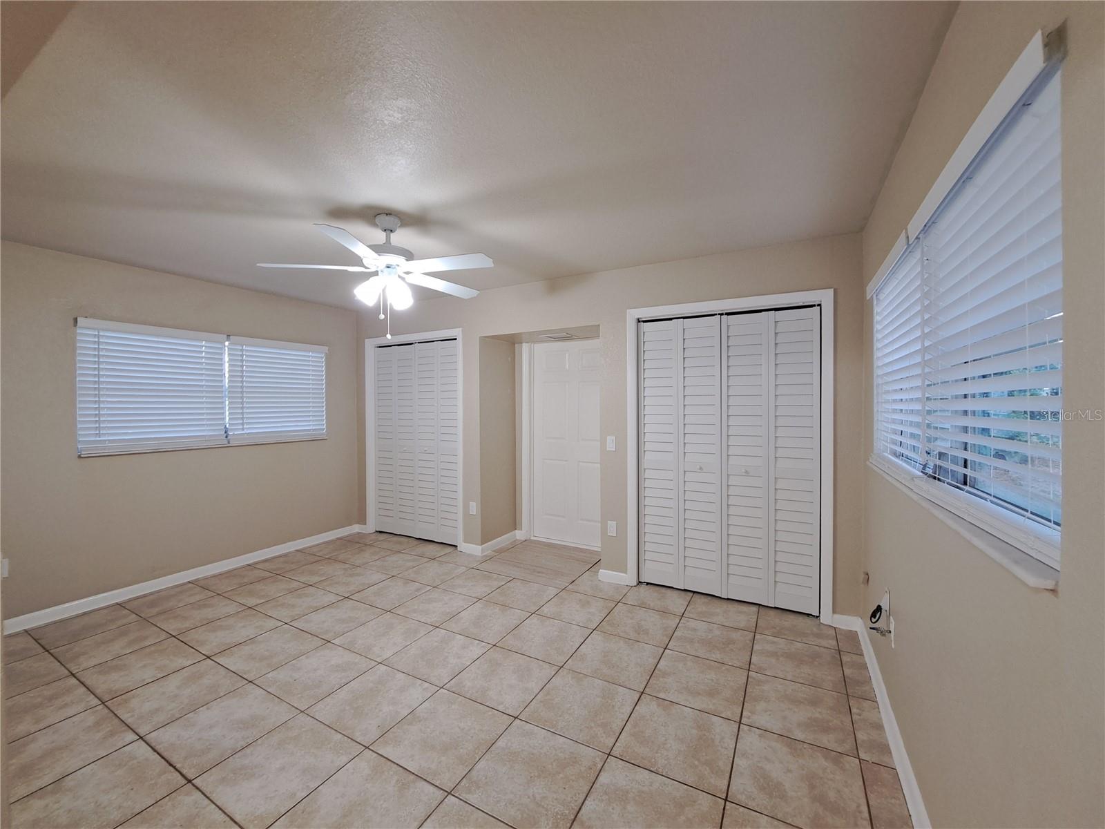 Double closets in this section of Primary as well as access to the expansive Utility area.