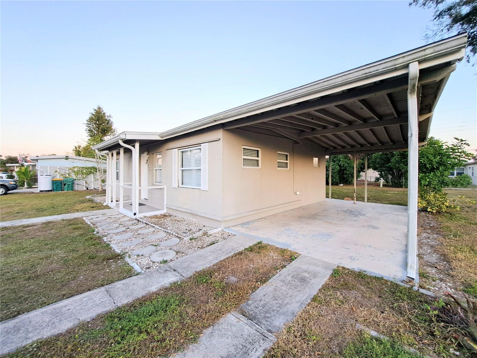 Driveway and Carport view.