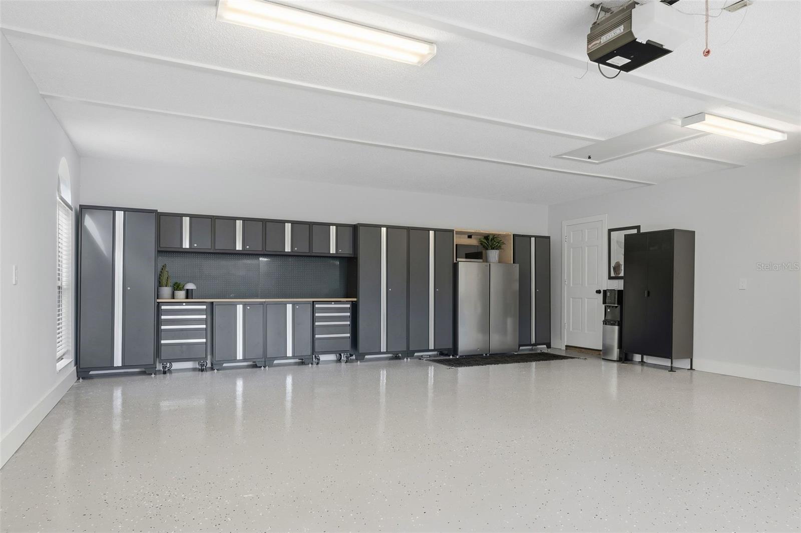 new cabinets and fresh epoxy flooring