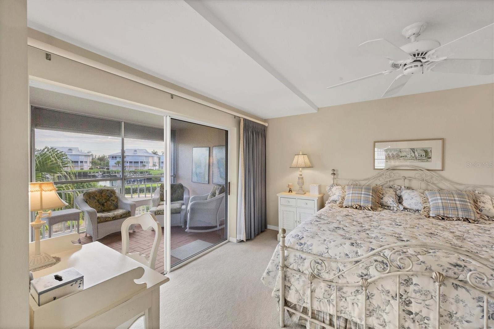 Master Suite extends to lanai and has great views overlooking the marina