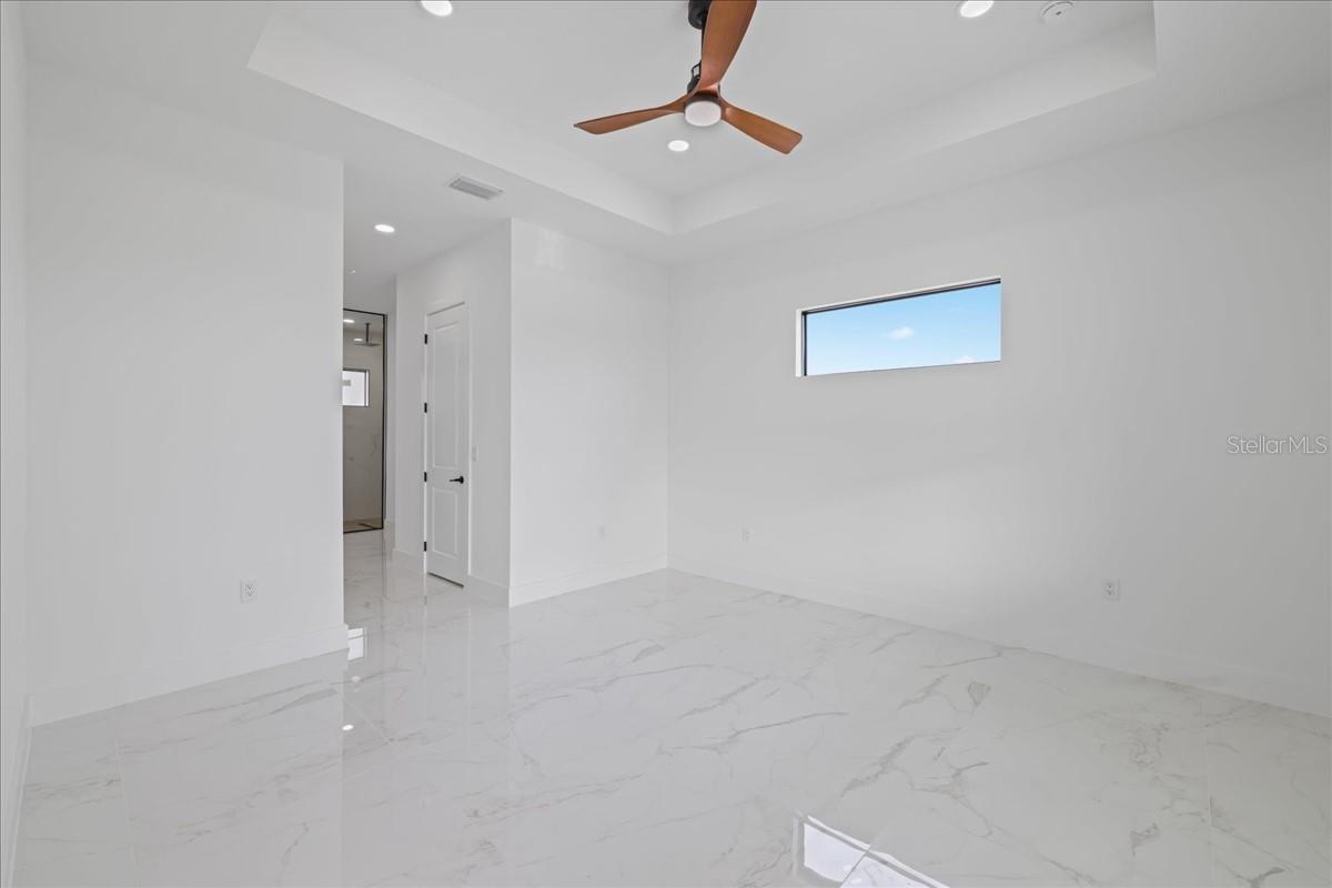 PRIMARY BEDROOM-PHOTO OF A COMPLETED MODEL
