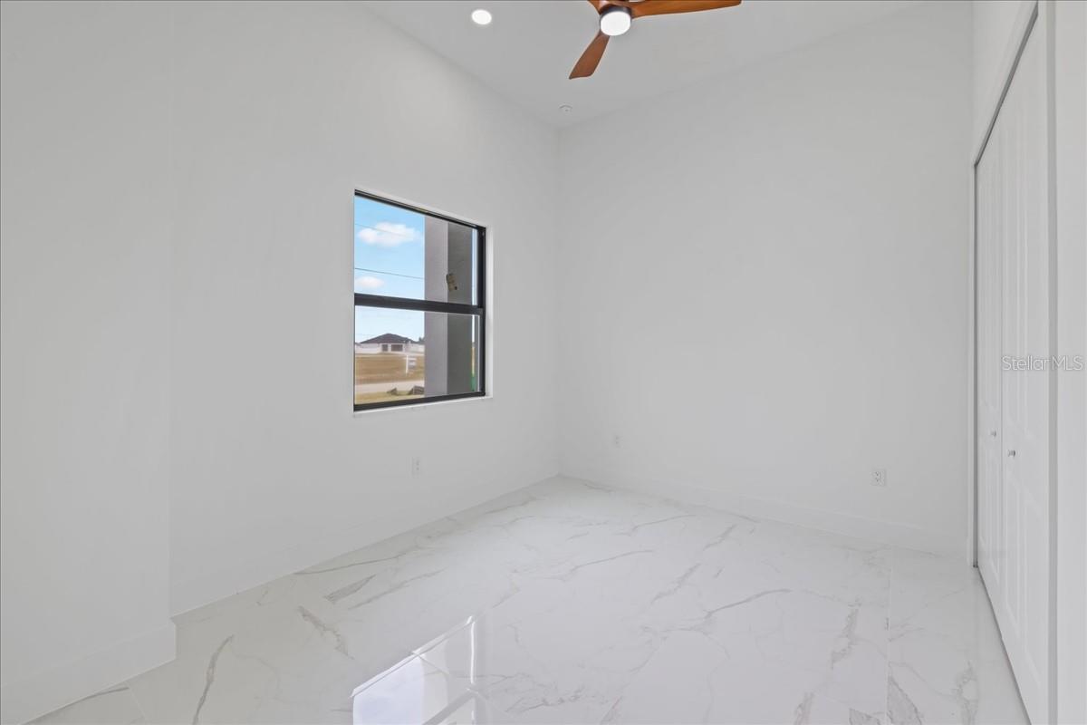 DEN- HAS CLOSET COULD BE USED AS BEDROOM. *PHOTO OF A COMPLETED MODEL