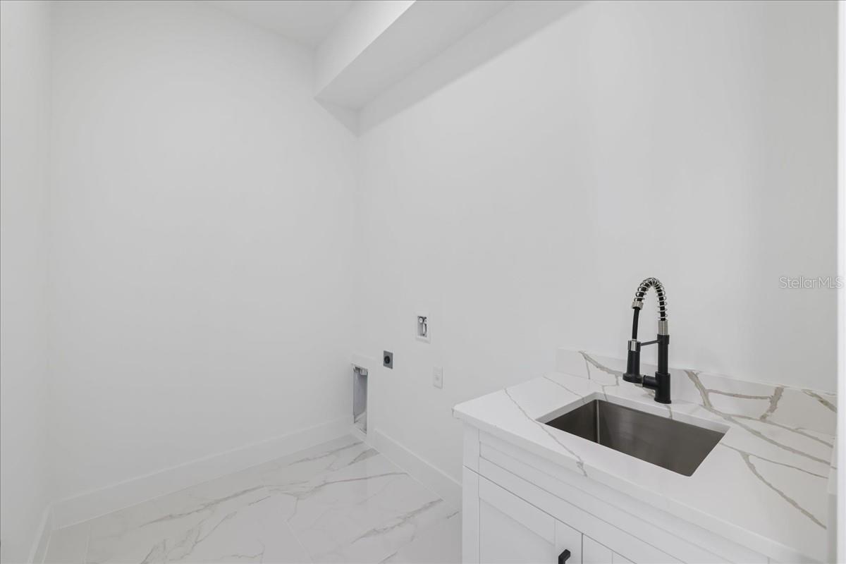 LAUNDRY- PHOTO OF A COMPLETED MODEL