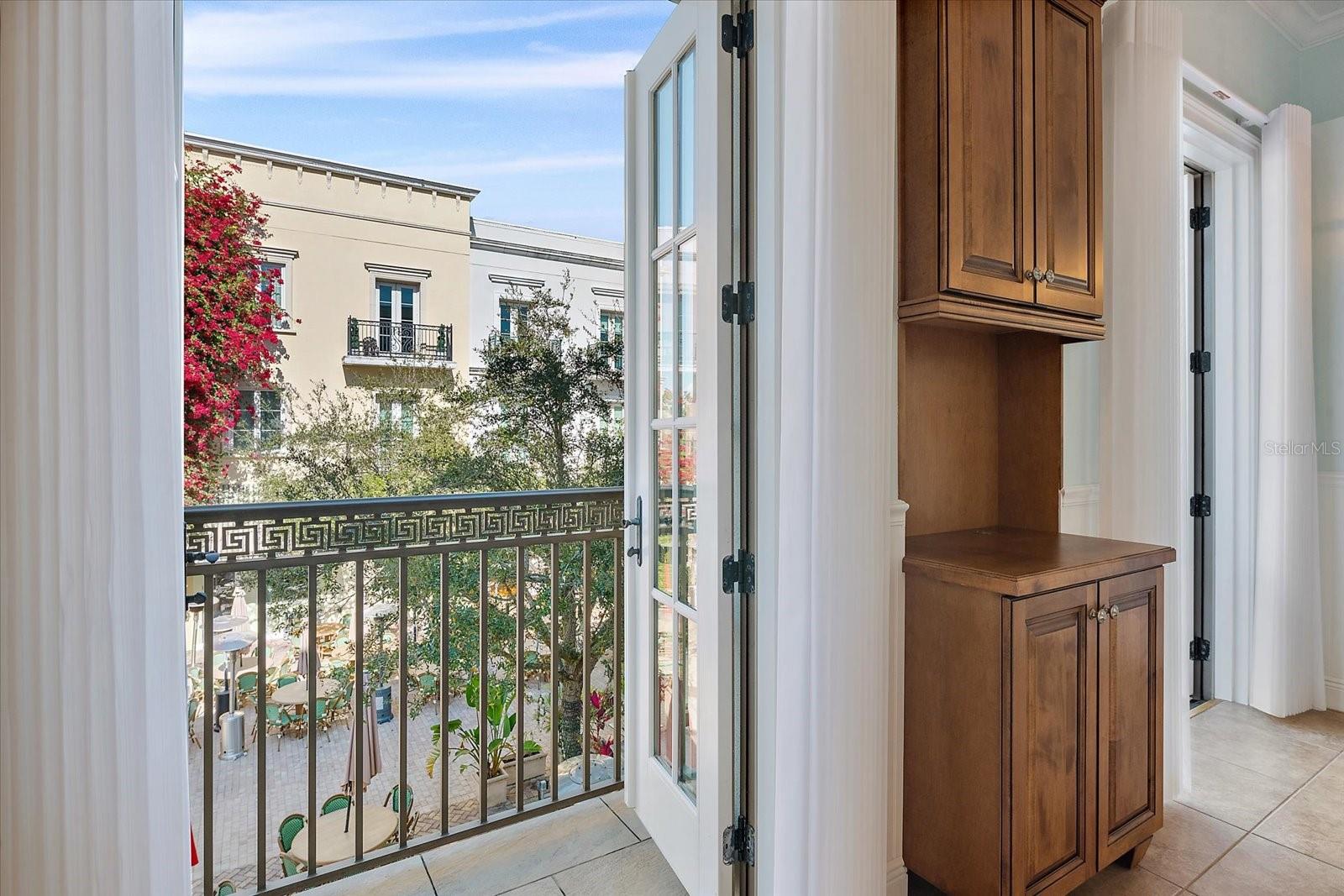 Courtyard-facing windows providing abundant natural light