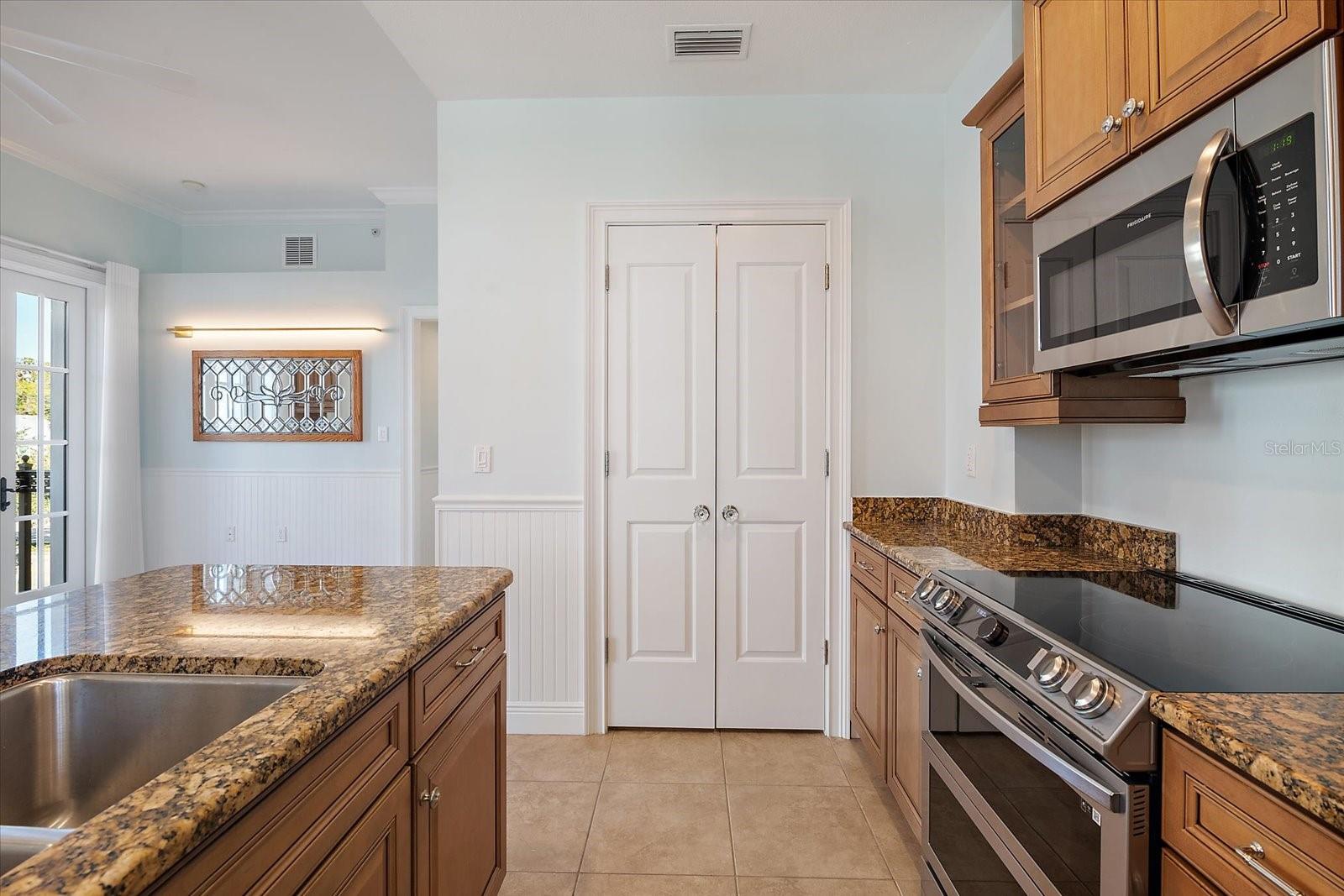 Kitchen with ample cabinetry and stainless appliances