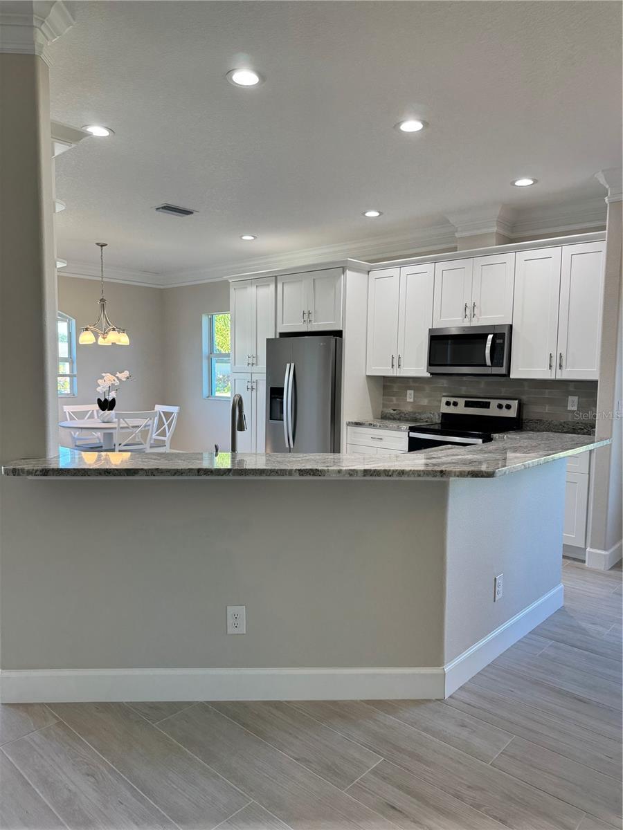 720 Redbud Ct, Englewood, FL 34223 — photo 12 of 47