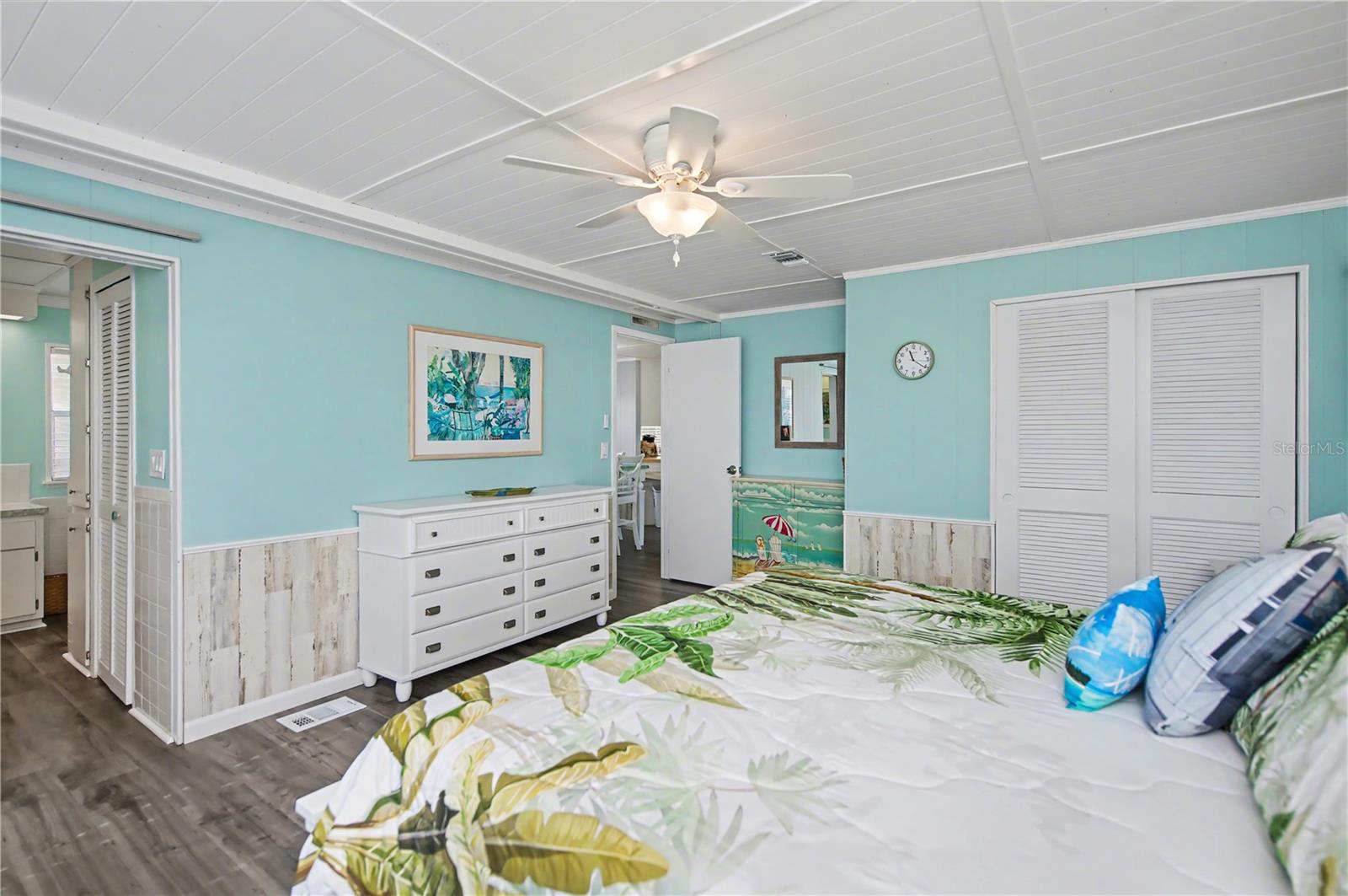 Hidden behind the double doors is a fantastic walk-in closet.