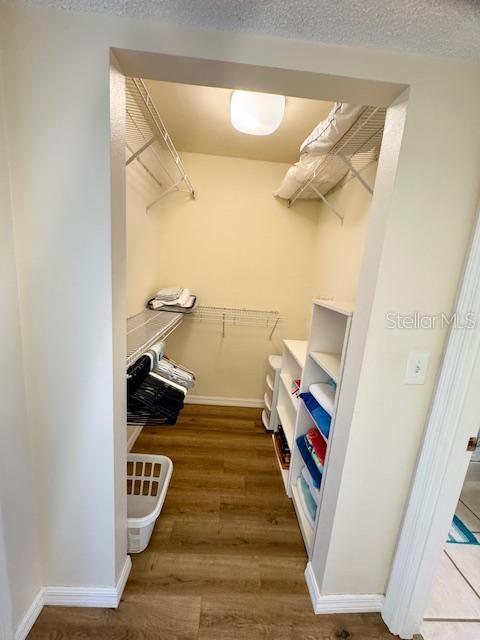 Primary Walk-In Closet in hall to Ensuite