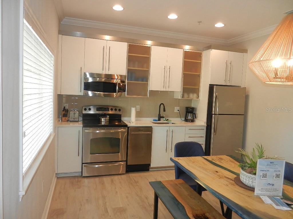 Updated Kitchen with Custom Table and Bench.