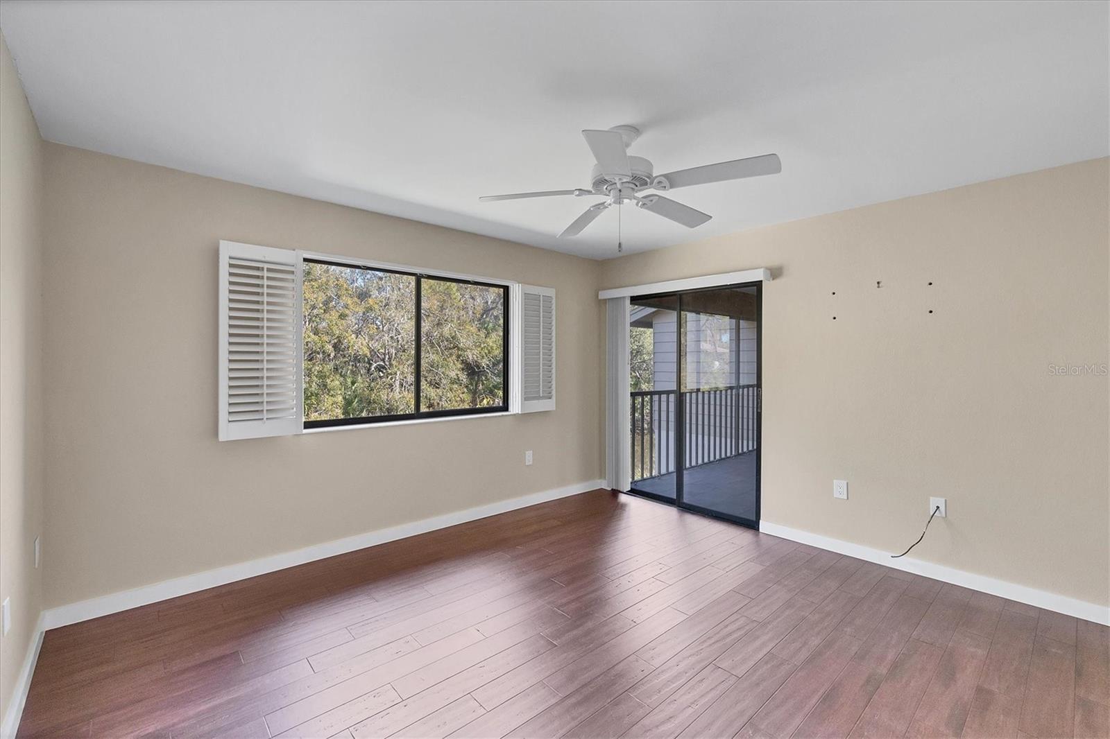 Primary bedroom, sliders to rear lanai