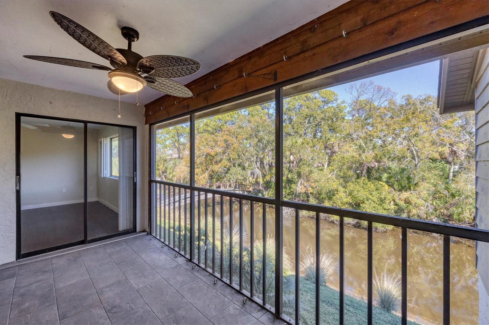 Rear Lanai wooden bridge and Creek view