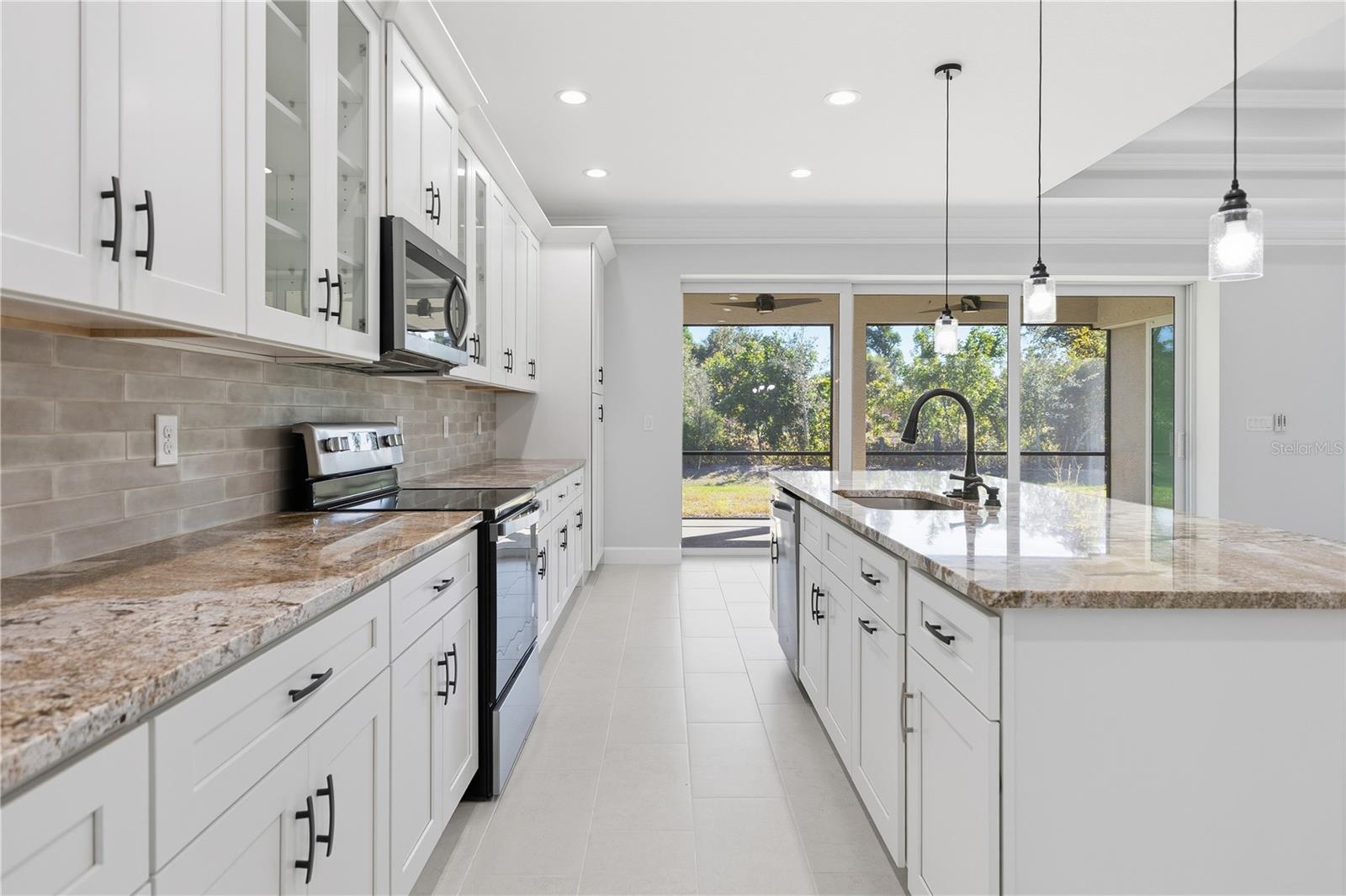 721 Redbud Ct, Englewood, FL 34223 — photo 11 of 51